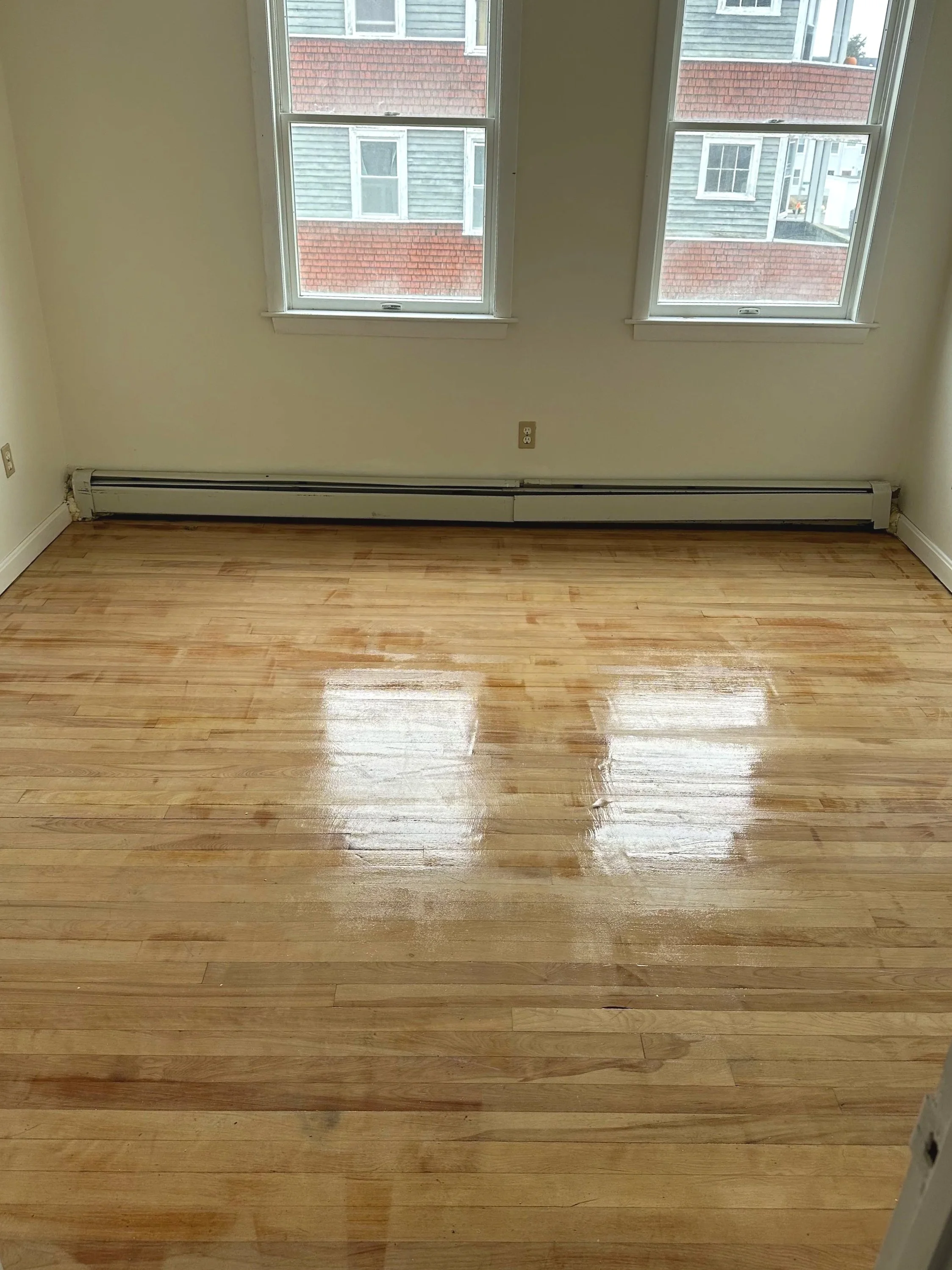 Hardwood floor refinishing service in Worcester Massachusetts restoring worn wood flooring
