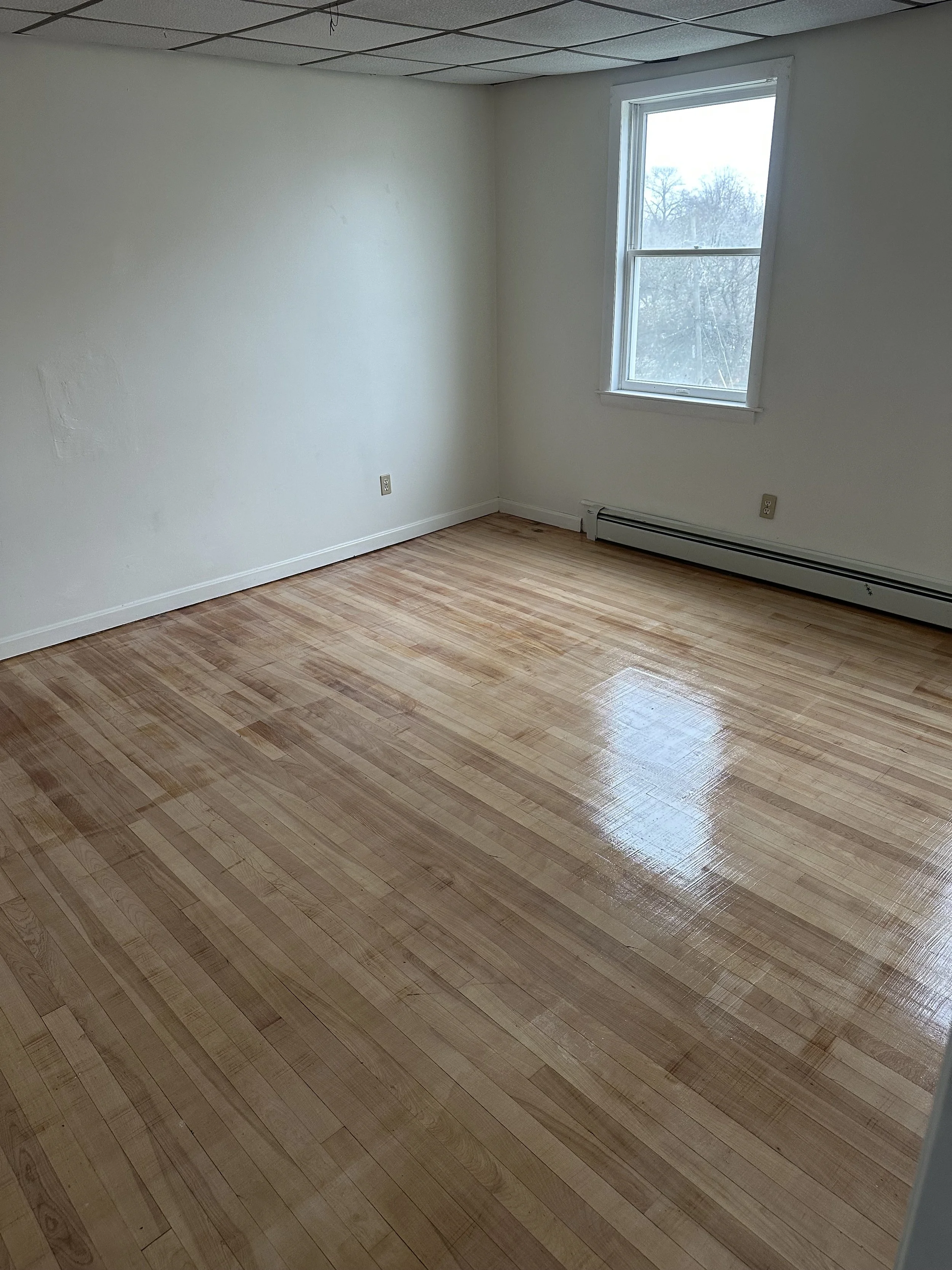 ardwood floor restoration project completed in Worcester MA bringing old wood floors back to life