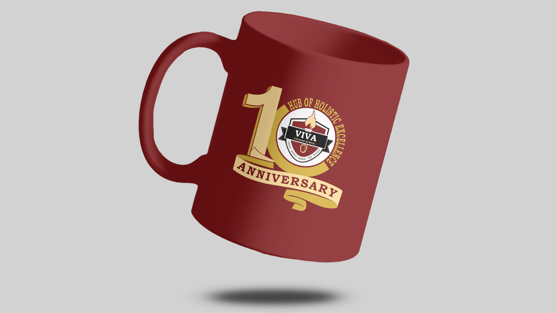 A red coffee mug with a 10th anniversary logo for VIVA College School, featuring a large golden number 10, the college's emblem, and the words "Hub of Holistic Excellence" and "Anniversary".