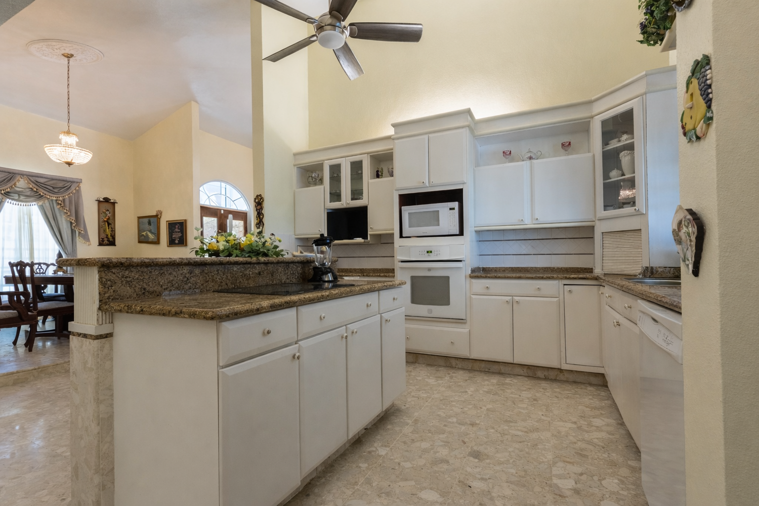 Bright and airy kitchen with dining view.png