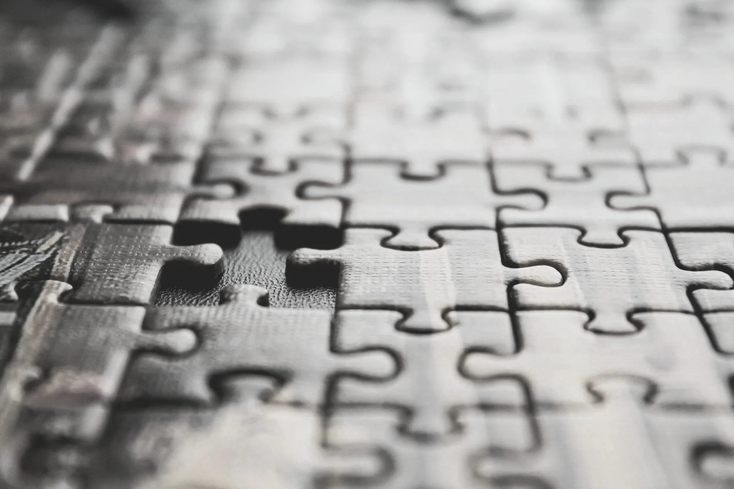 Completed puzzle with one missing piece — bridging the gaps in your compliance systems