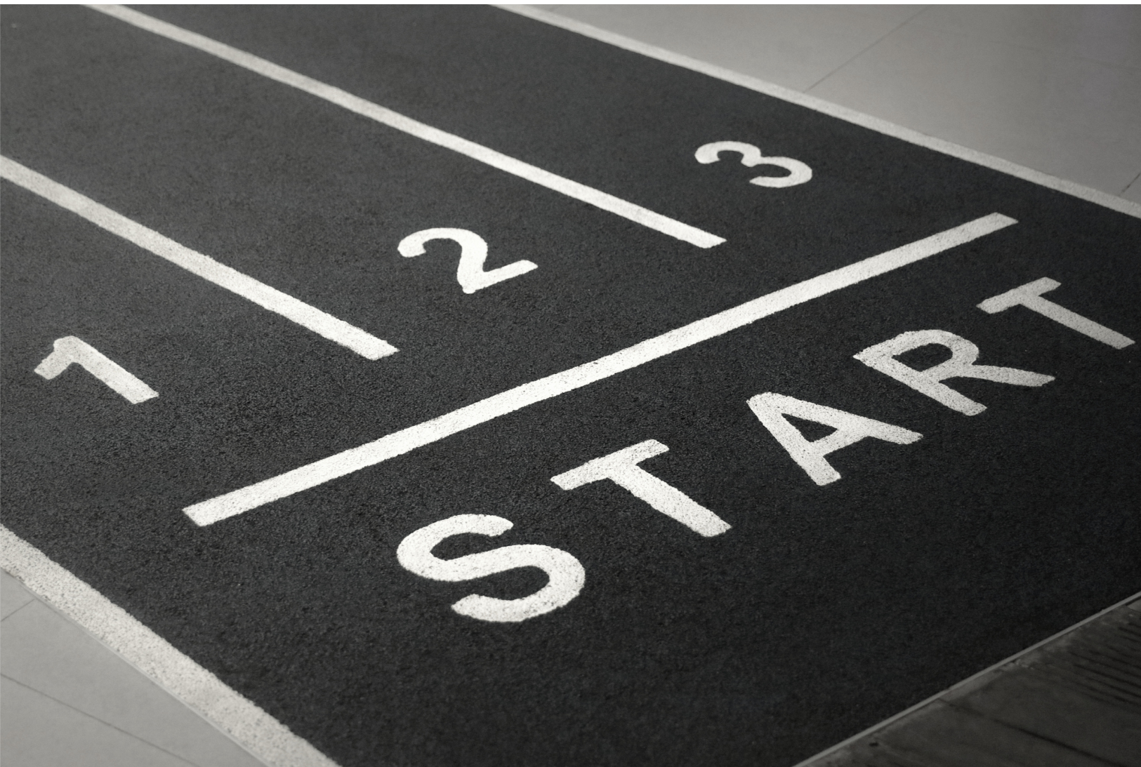 Starting line on a race track — beginning your workplace compliance journey with CORE