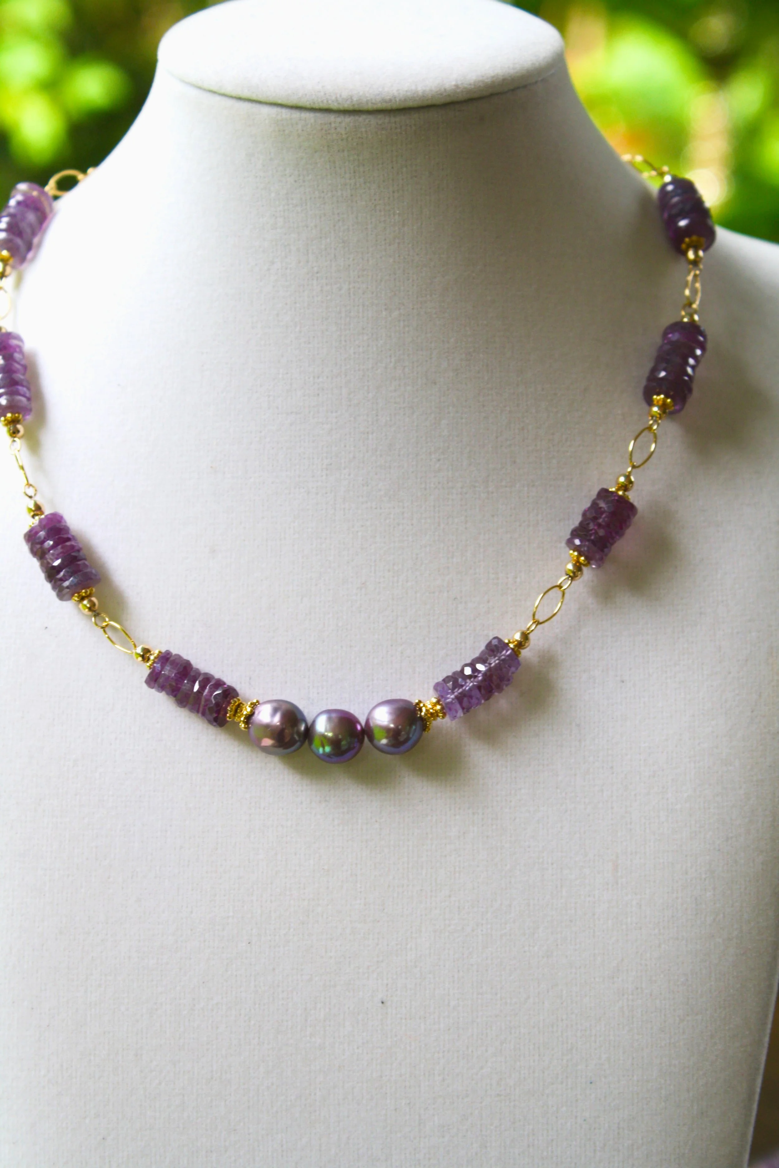 Alexandrite gems with Edison pearls