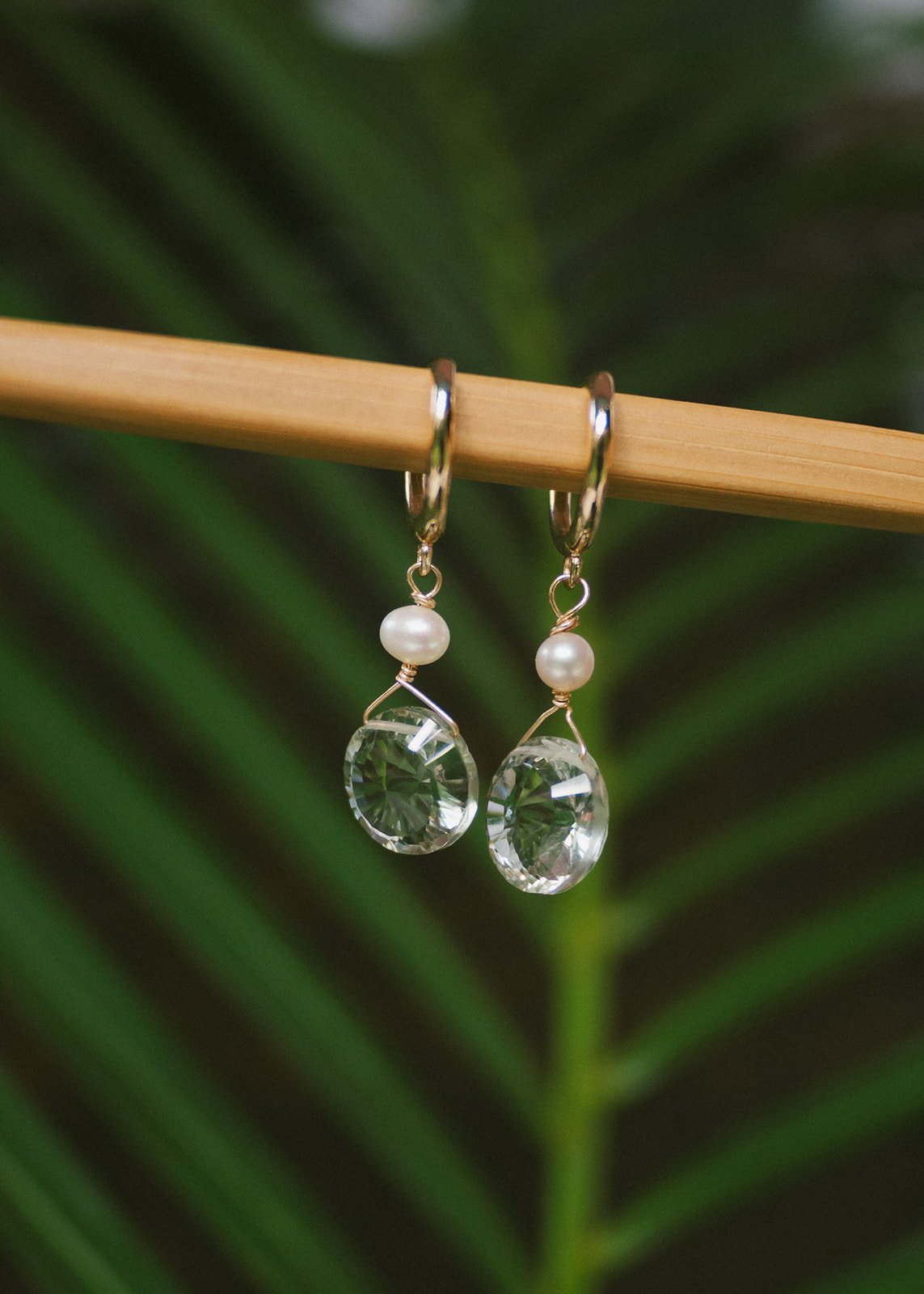 Luxury pearl and clear gemstone drop earrings, elegant handcrafted jewelry perfect for brides, weddings, and timeless Hawaiian style.
