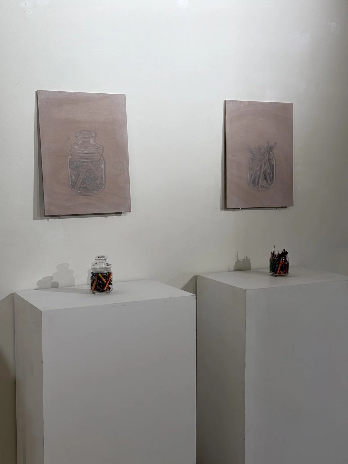 untitled,
2025,
graphite, wood planks, glass jars, colored pencils,
14cm x 19cm