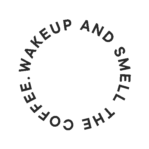 Circular text on a black background that reads "Come Wake Up and Smell the Coffee" in a ring.