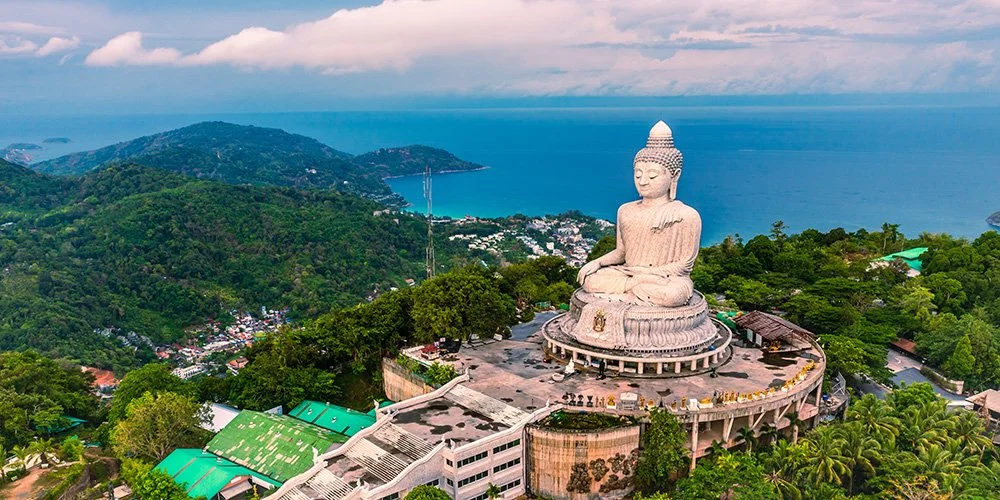 Visit Buddha statue with Young Travel.