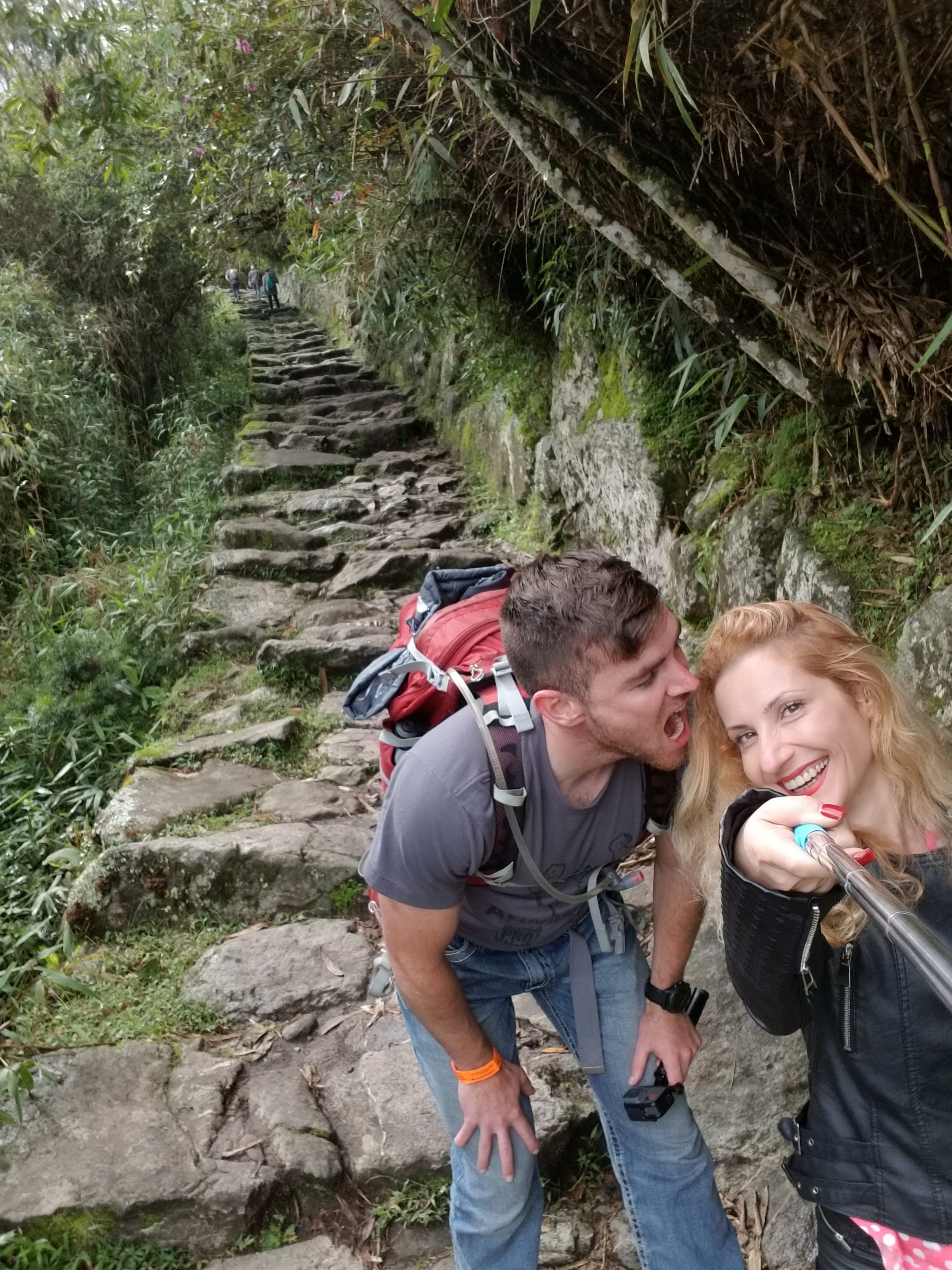 Climbing the ancient stone steps of the Inca Trail on the way to Machu Picchu in the Peruvian Andes.