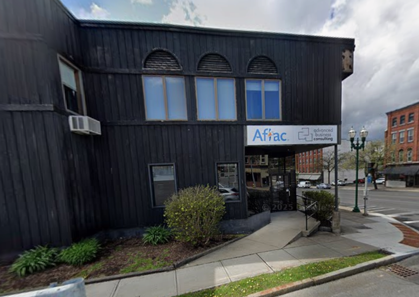 small business consultant ny state office with advanced business consulting sign aflac sign and building