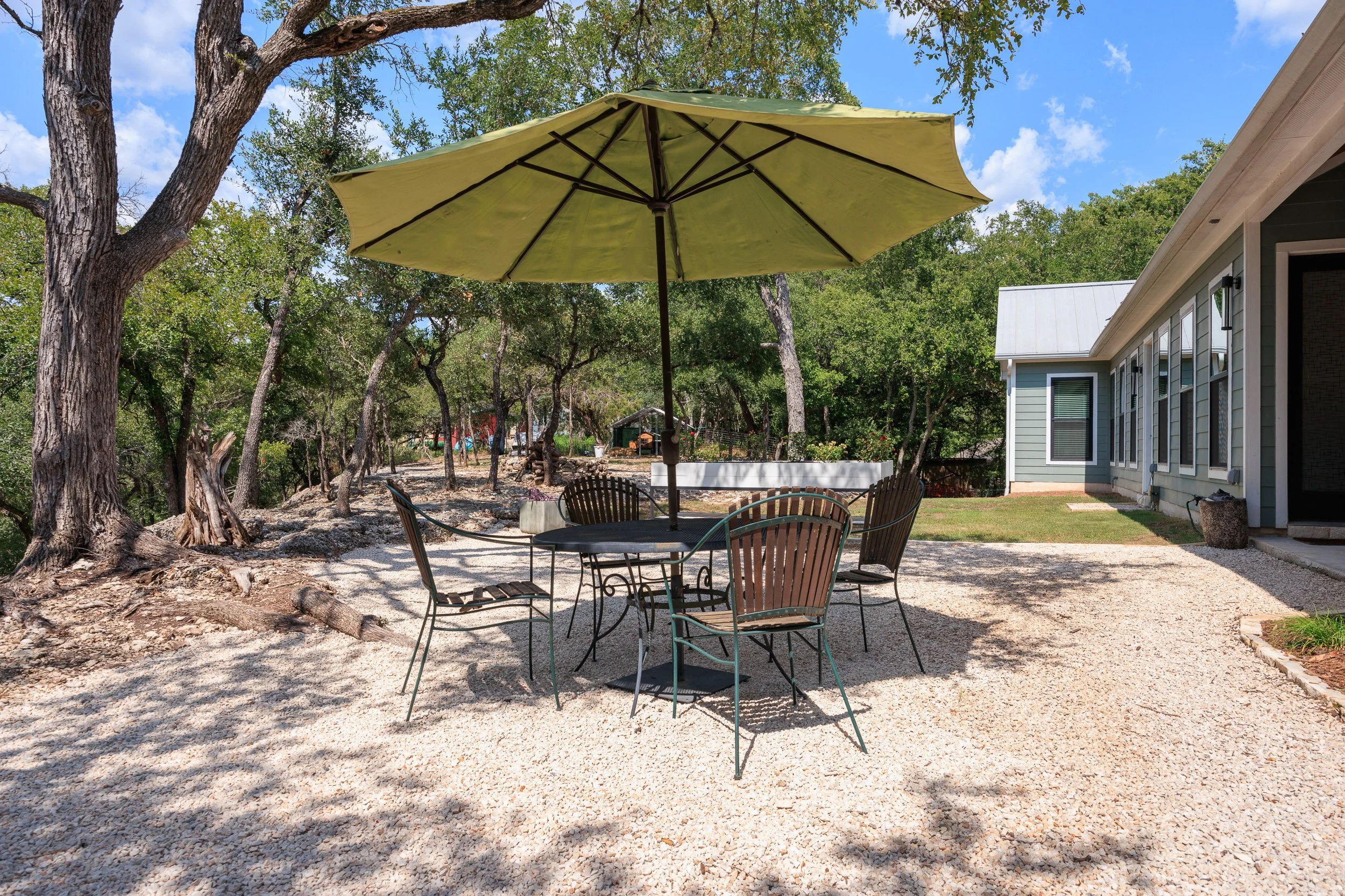 Luxury Home for Sale in Texas Hill Country  - 104 River Road Circle, Wimberley, TX - Backyard 