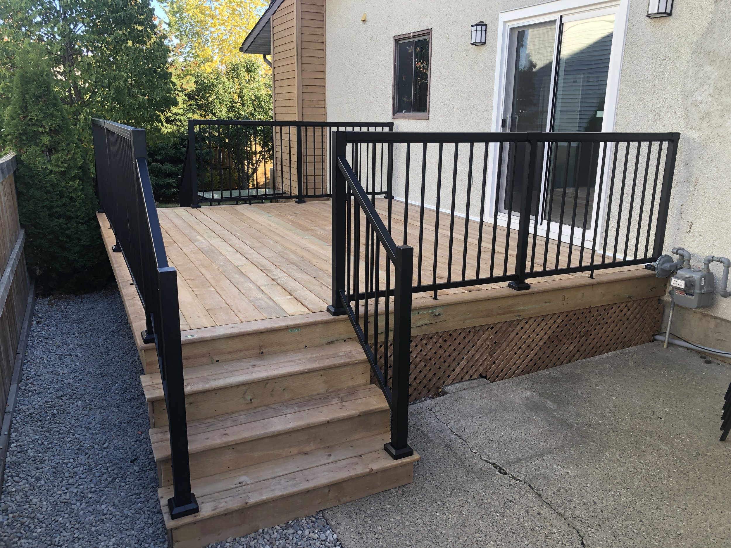 Pressure treated deck with Vista aluminum handrail