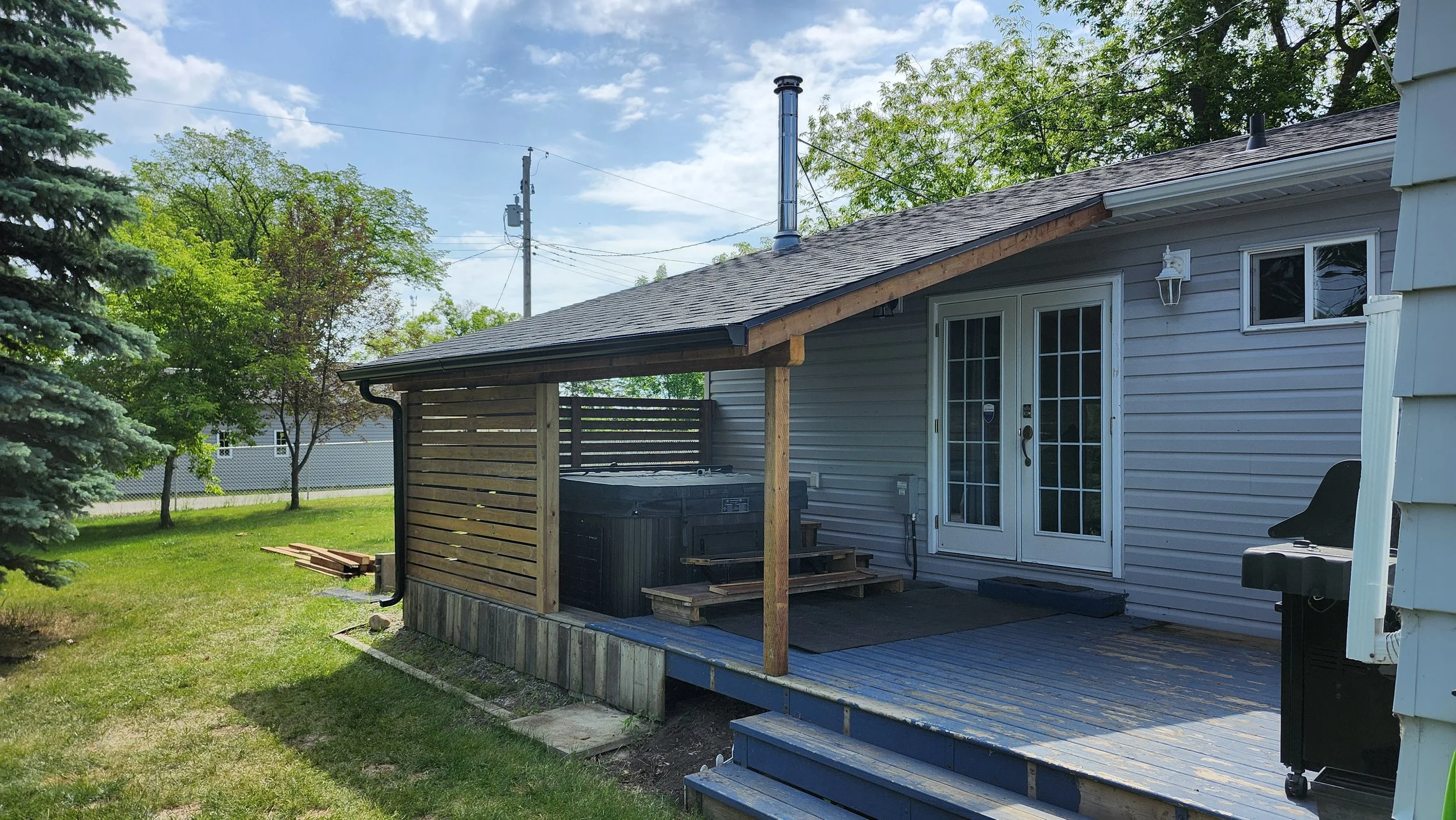 Hot tub deck roof support