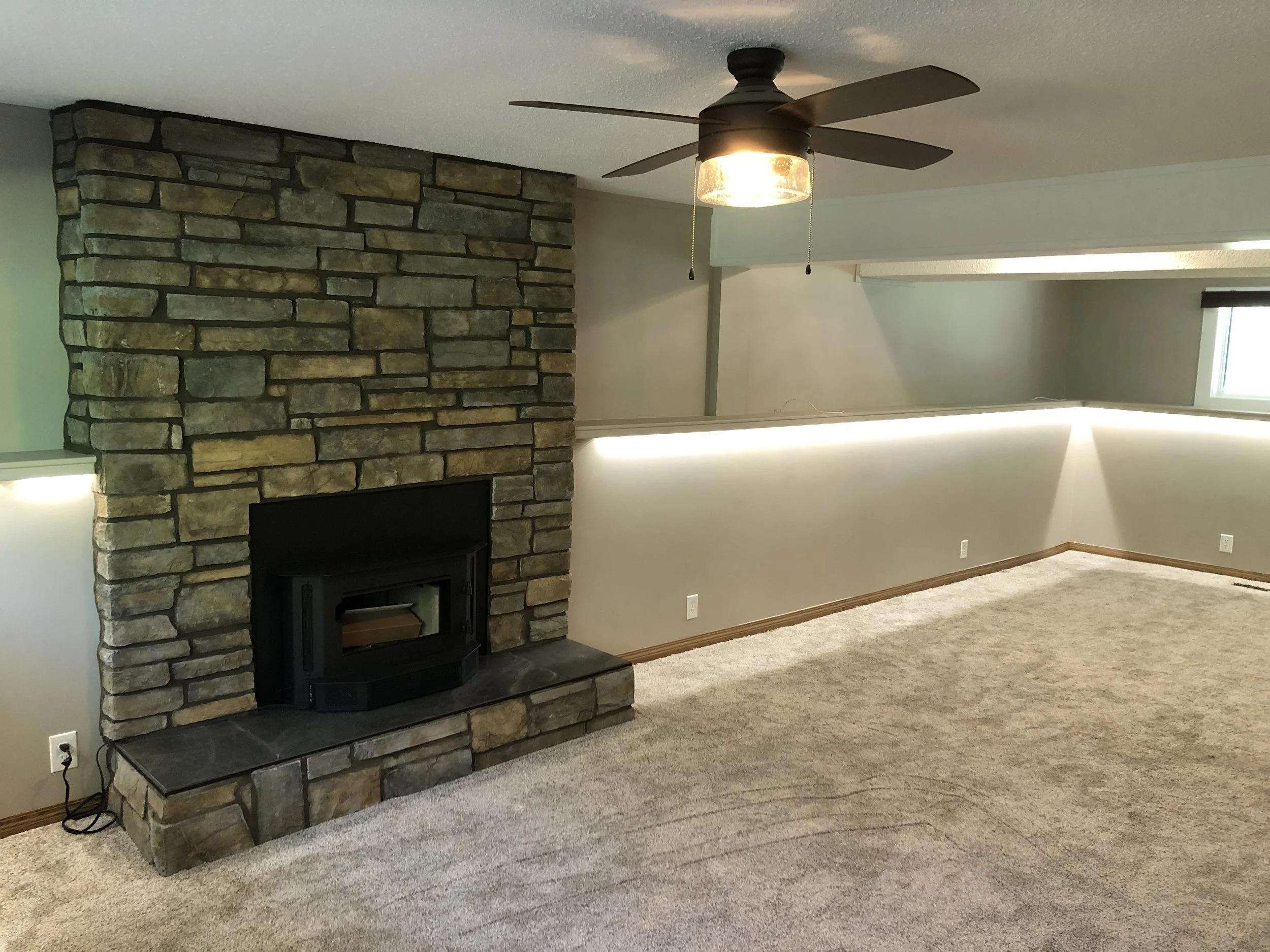 Rock install fireplace