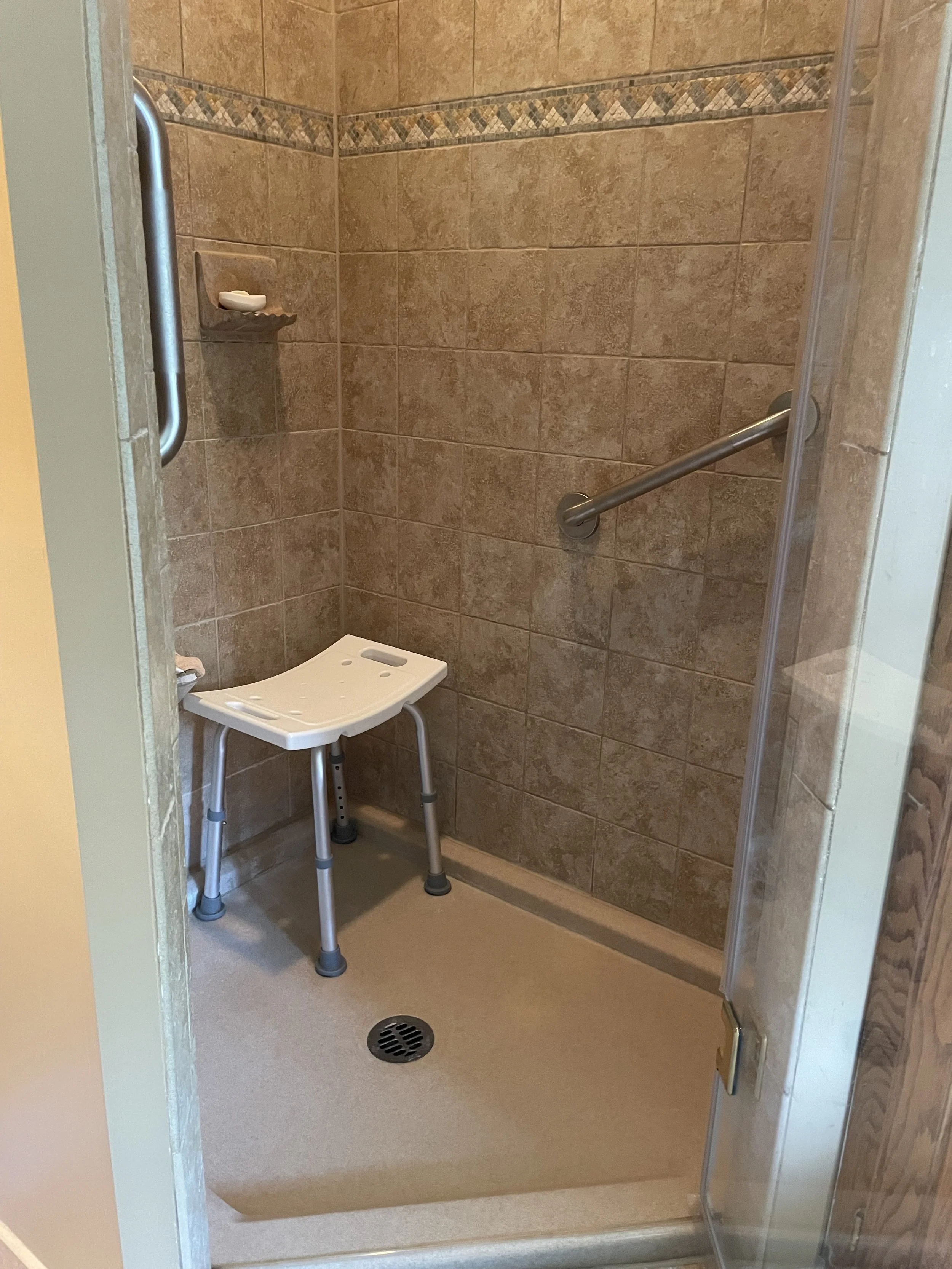 Grab bar installed next to bed for safe mobility and balance