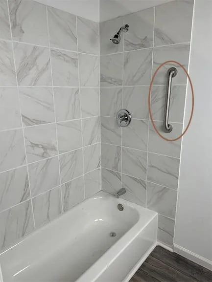 vertical grab bar in shower