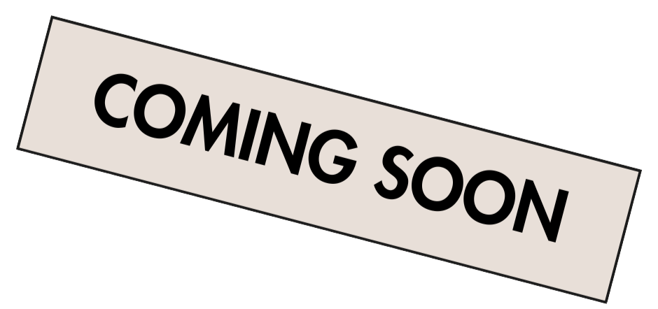A rectangular sign with a beige background and black text that reads 'COMING SOON'.