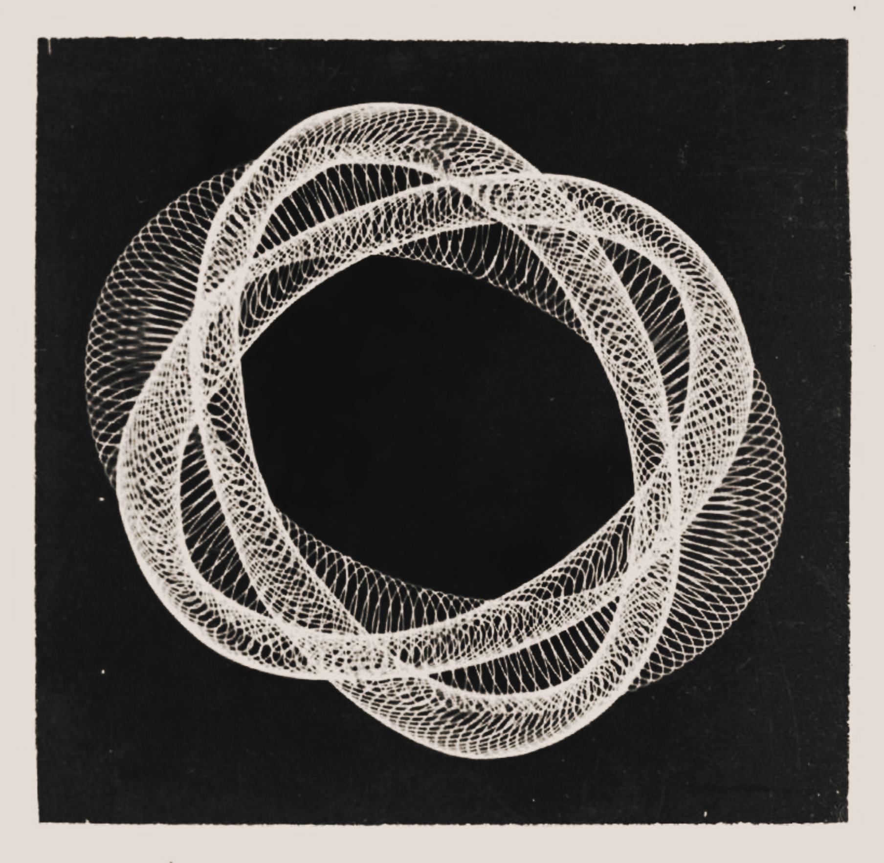 A monochrome image of a geometric design on a black background.