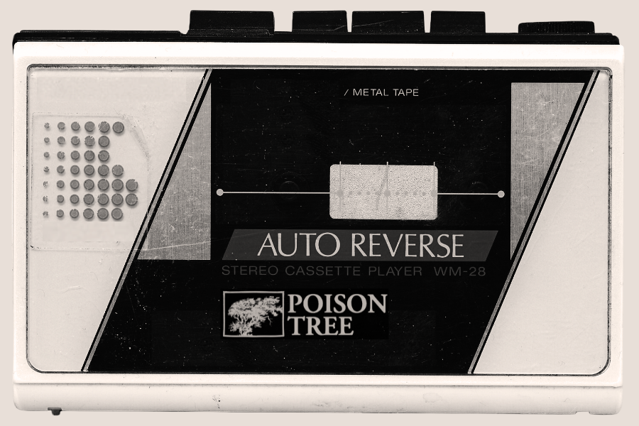A vintage Poison Tree stereo cassette player labeled 'Auto Reverse', model WM-28, with a black and white design and a speaker on the left side.