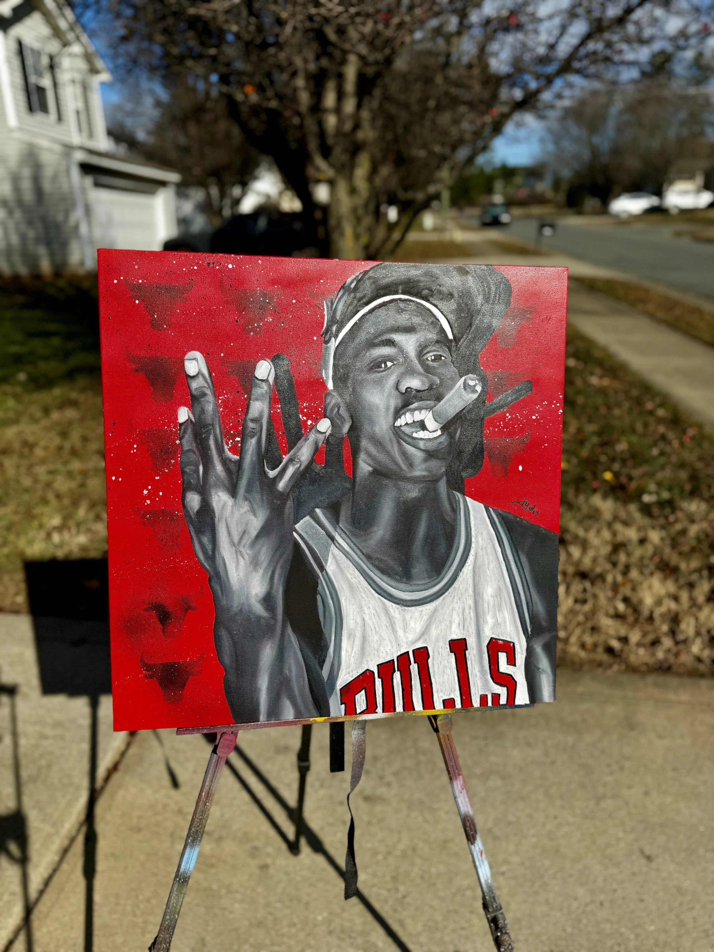 A painted portrait of a young man wearing a Chicago Bulls basketball jersey, holding a cigar in his mouth, with a red background and black and white accents.
