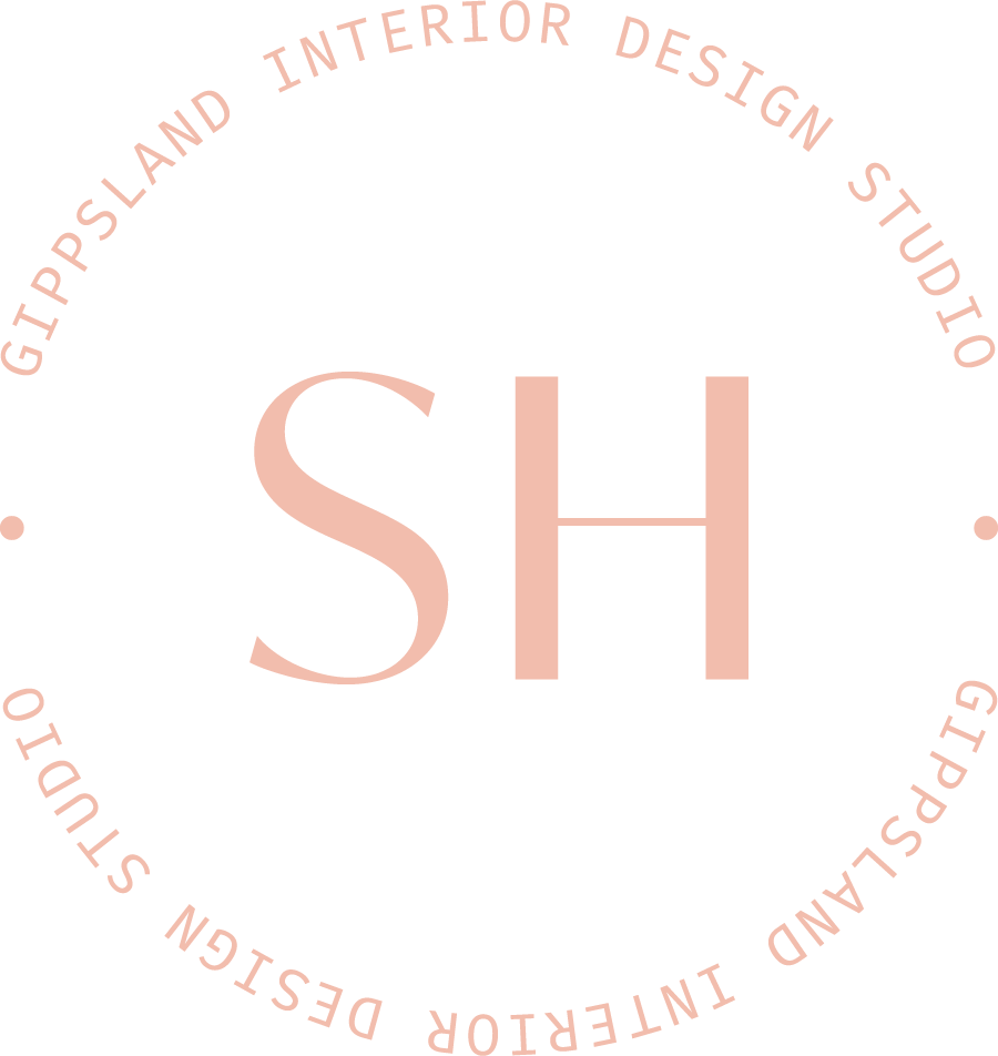 Logo for Studio Hue, Gippsland Interior Design Studio with large initials SH in the center and the text 'Gippsland Interior Design Studio' around the top and bottom in a circular layout, in soft pink color.