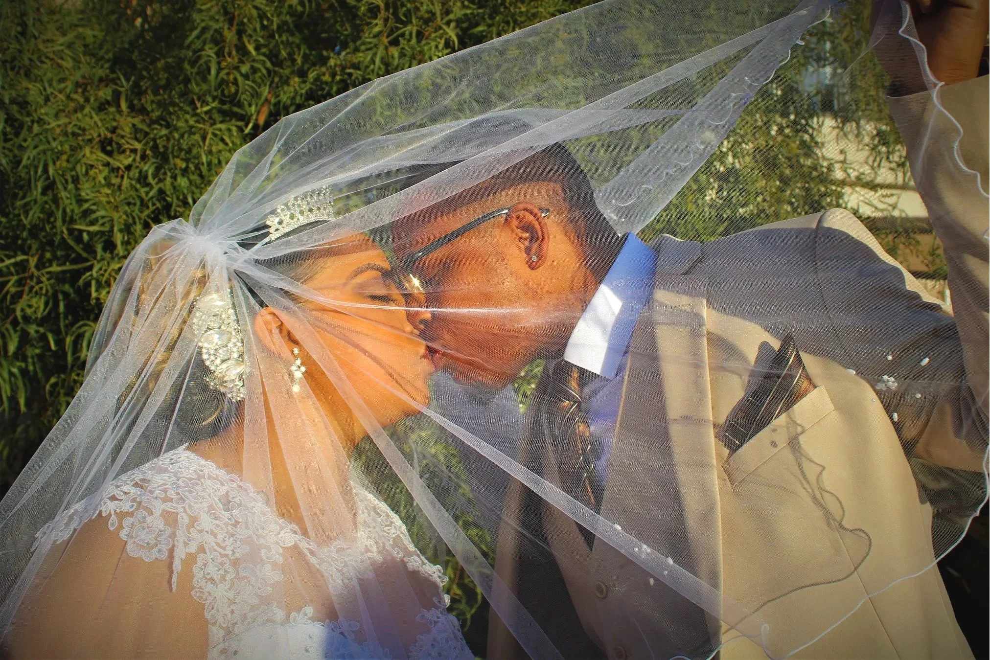 The+Bride+and+Groom%27s+First+Kiss.jpg
