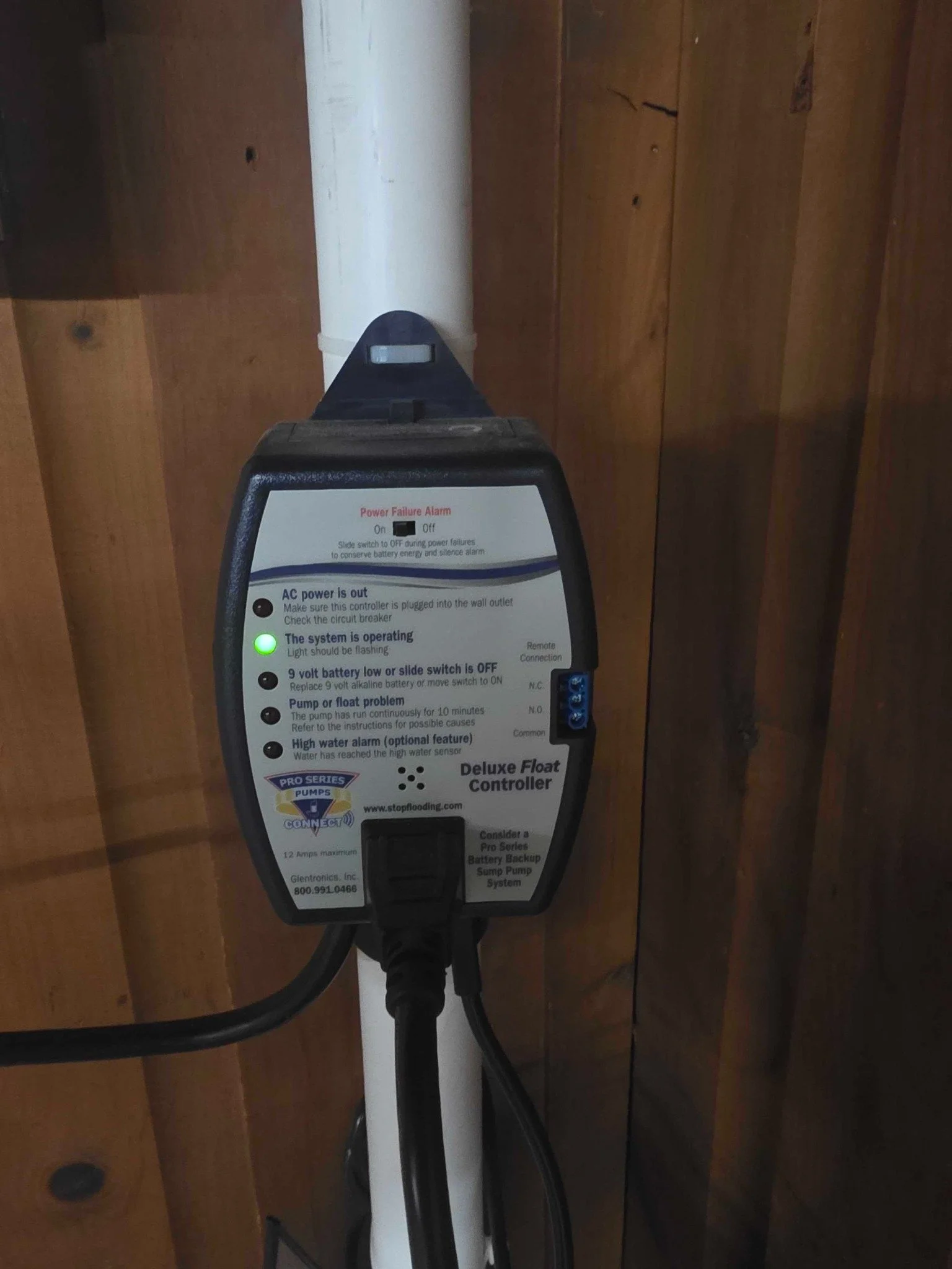 Sump pump battery-backup controller installed for added protection during power outages.