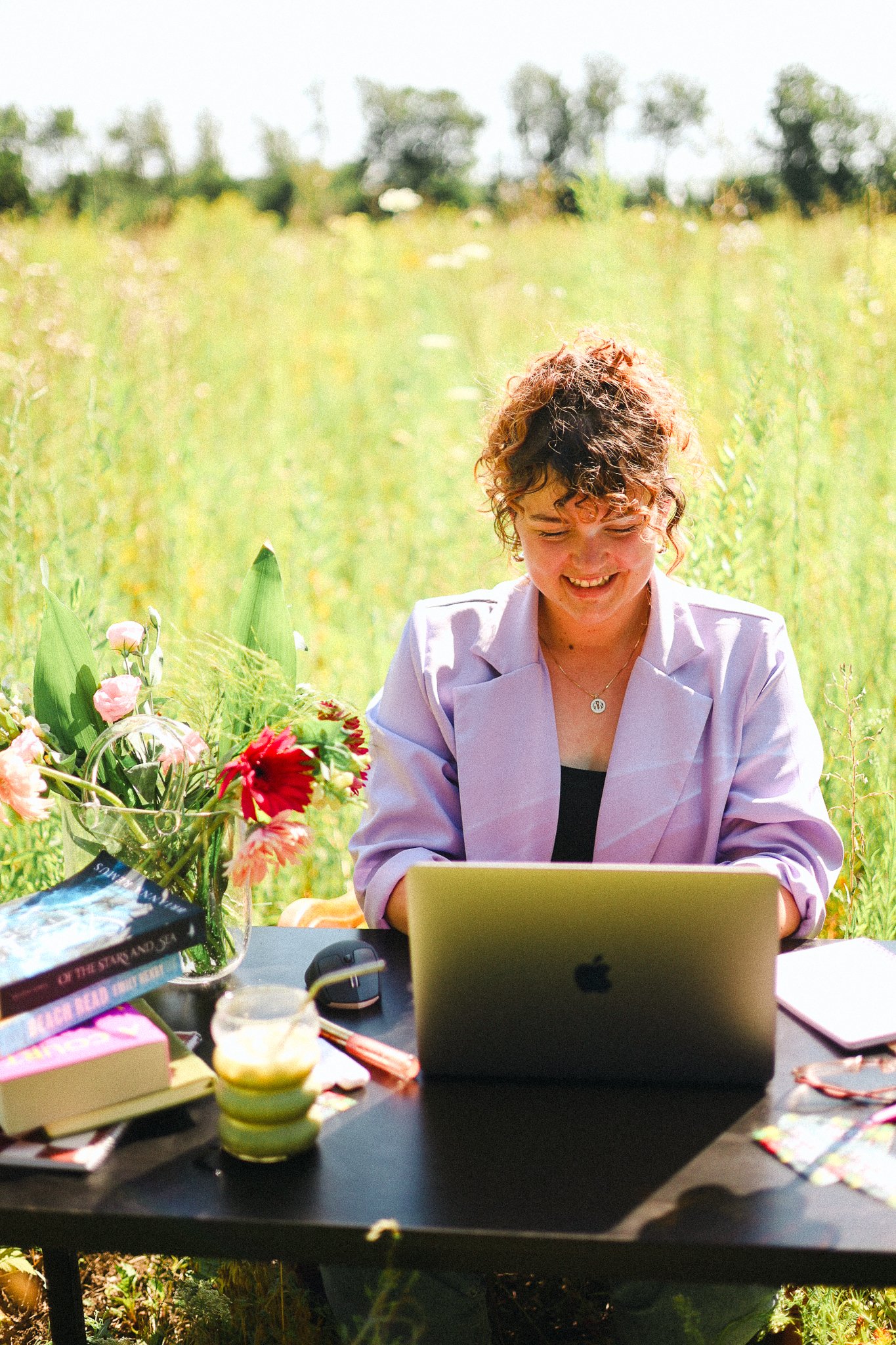 woman entrepreneur designing on laptop