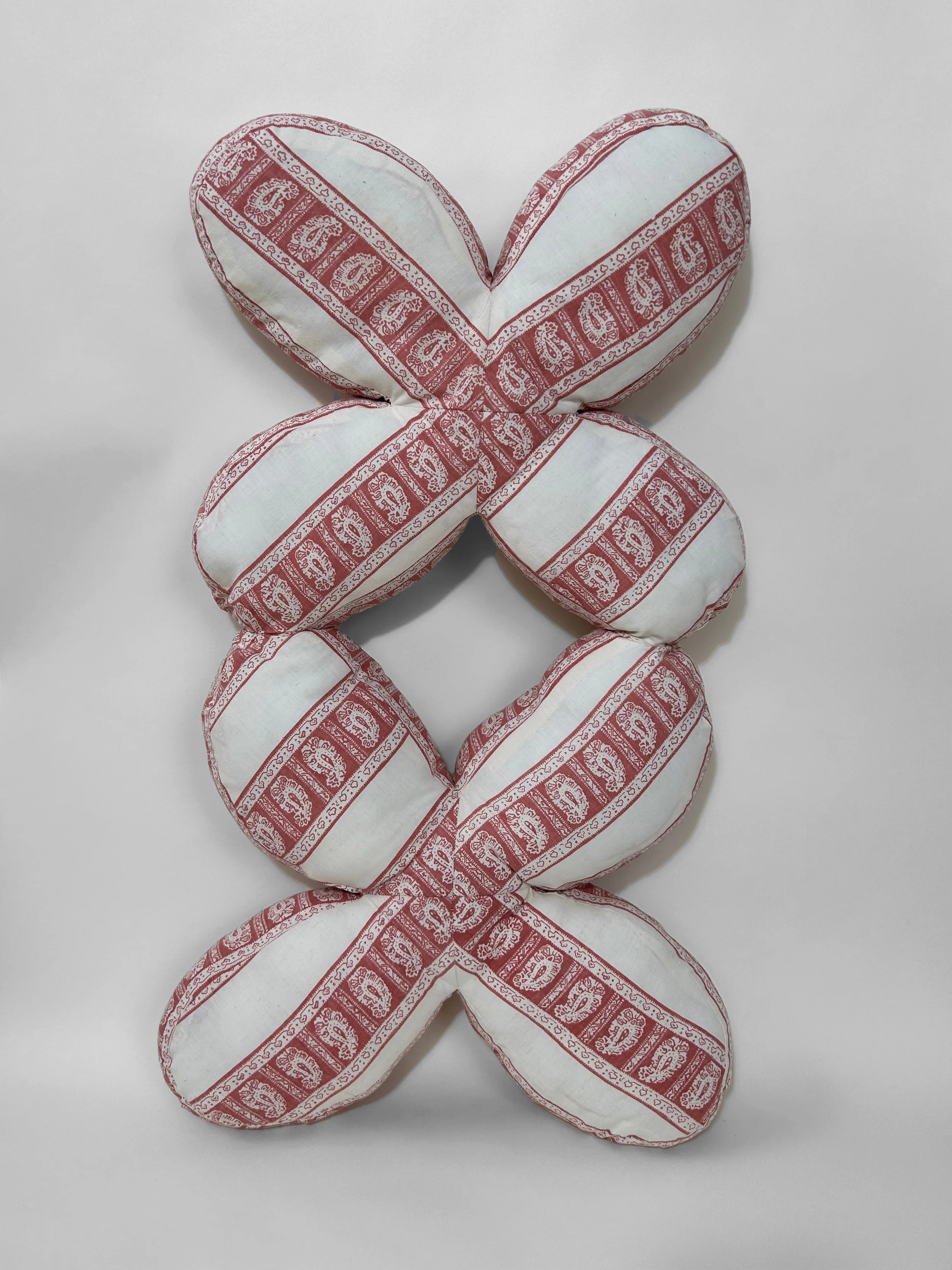 "Double Gemini" cotton, polyester thread, polyfil, 35" x 15" x 3", 2023