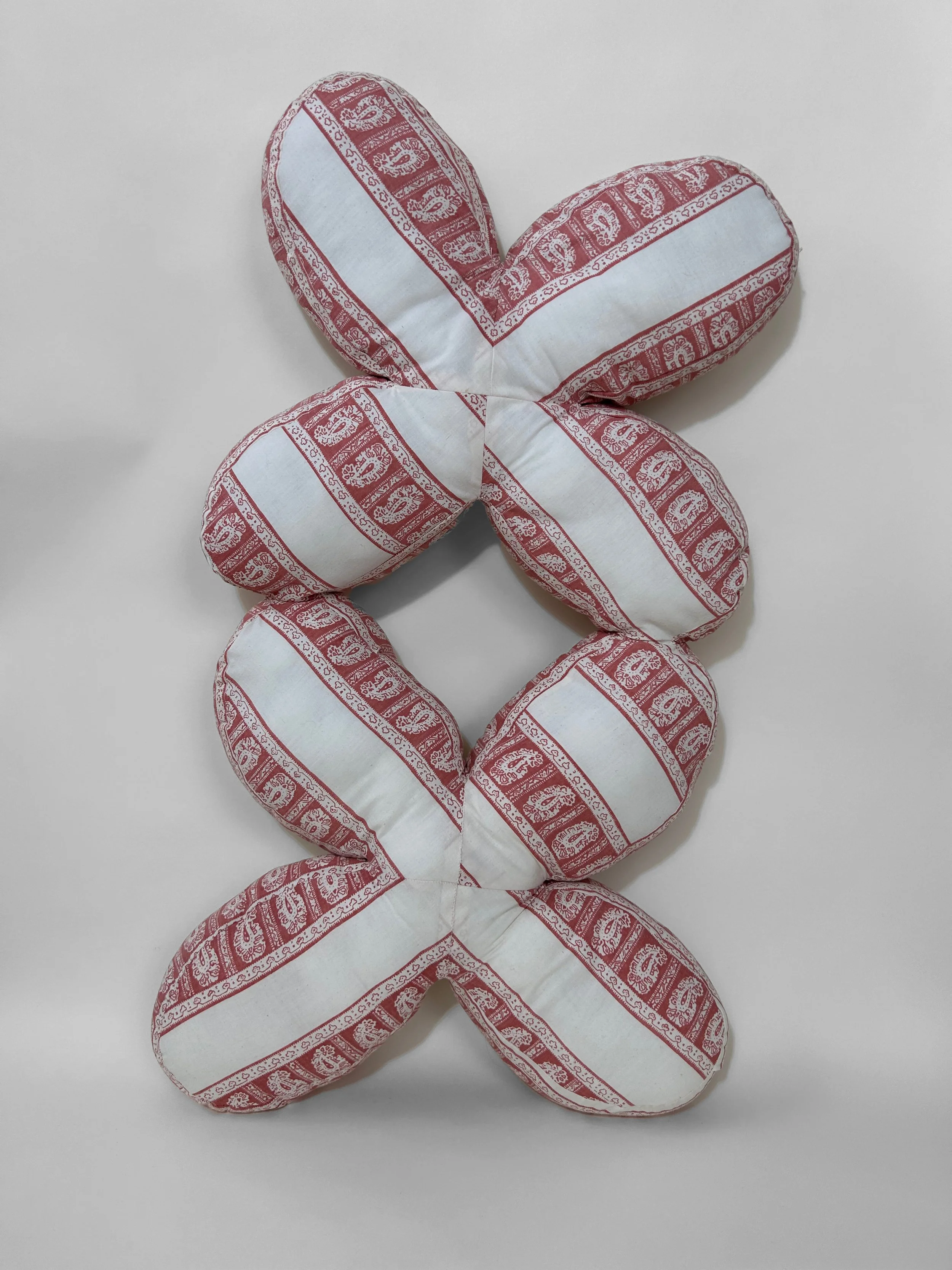 "Double Gemini" cotton, polyester thread, polyfil, 35" x 15" x 3", 2023