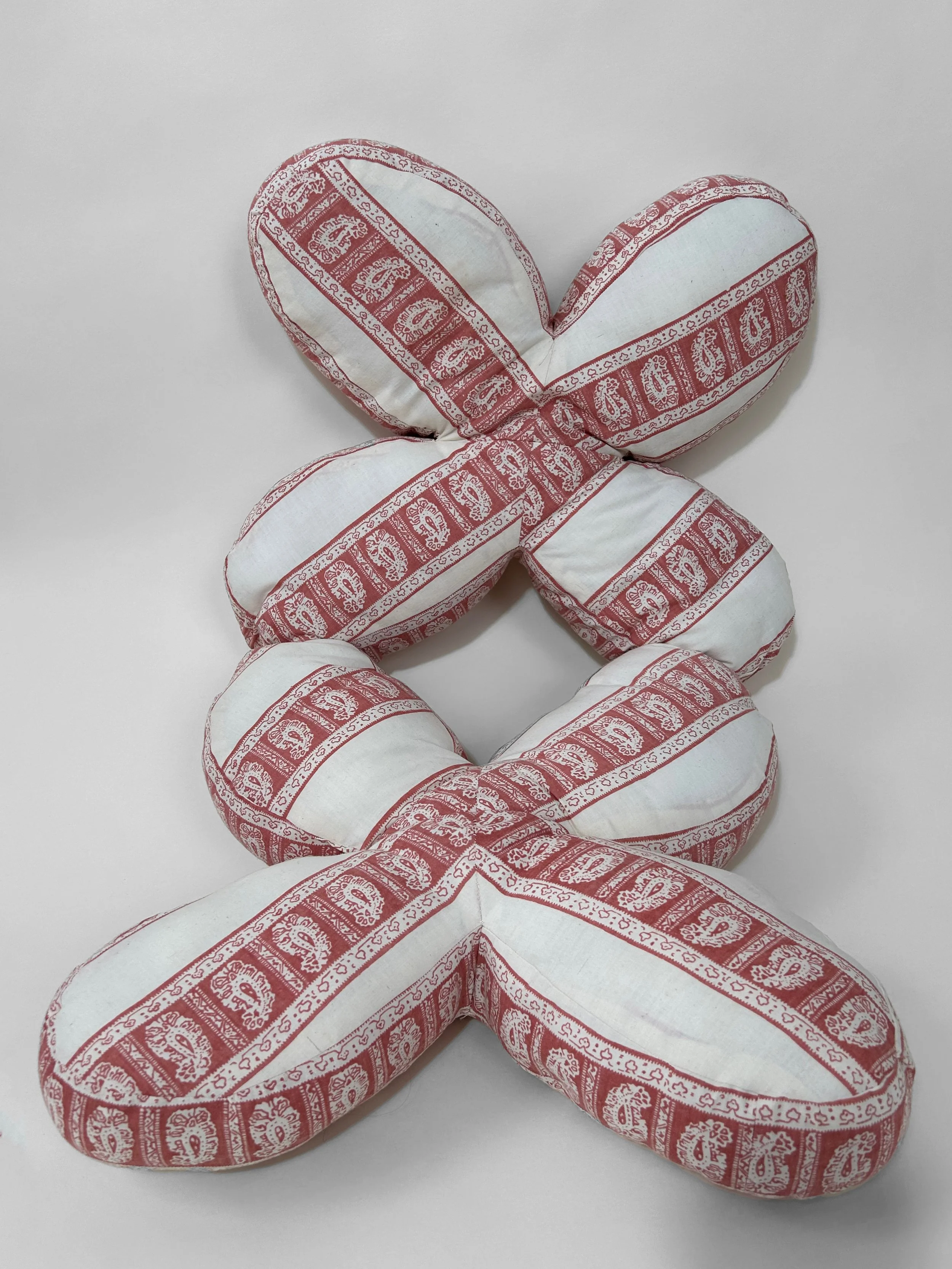 "Double Gemini" cotton, polyester thread, polyfil, 35" x 15" x 3", 2023