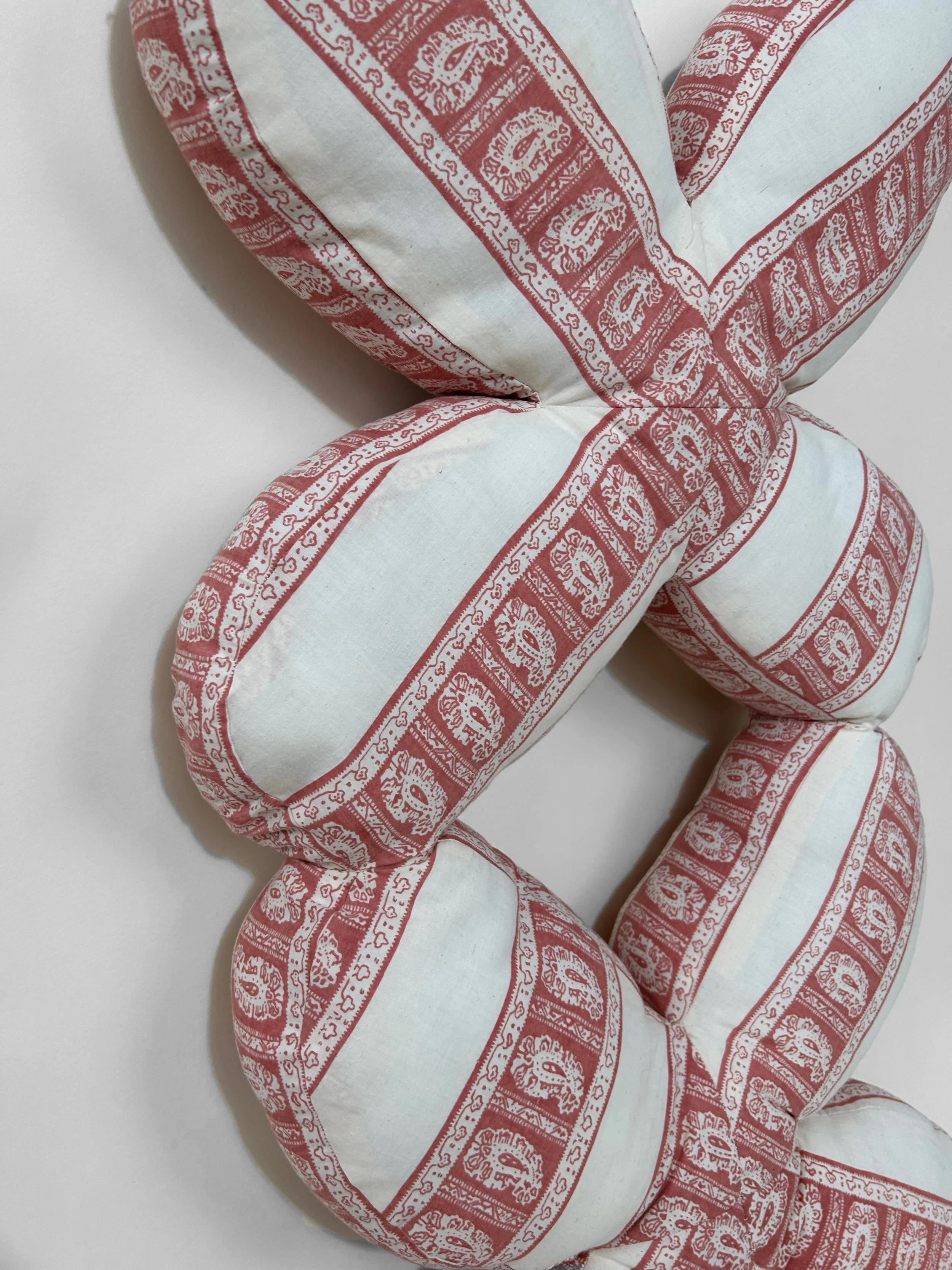 "Double Gemini" cotton, polyester thread, polyfil, 35" x 15" x 3", 2023