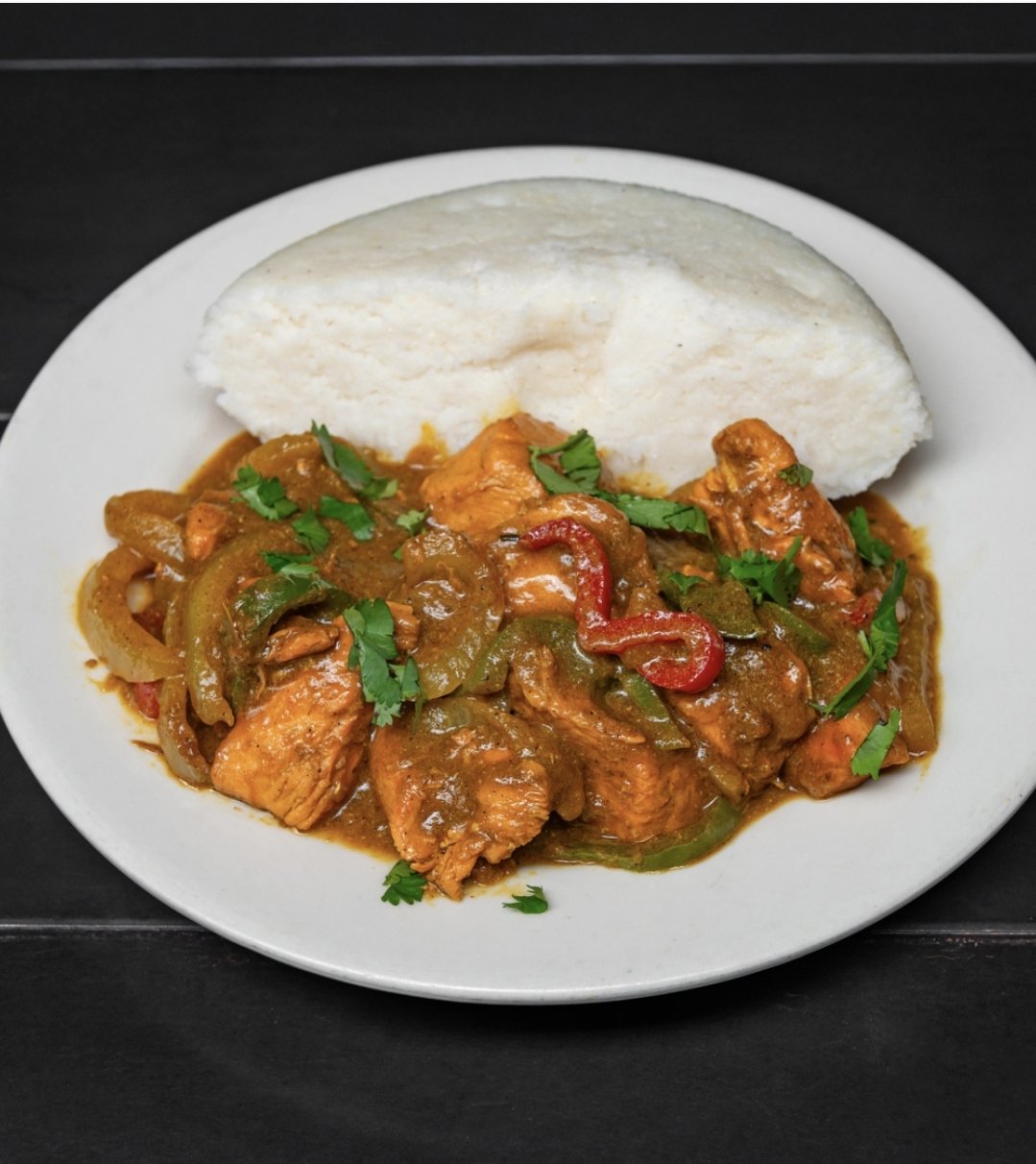 Plate of Chicken Curry & Ugali