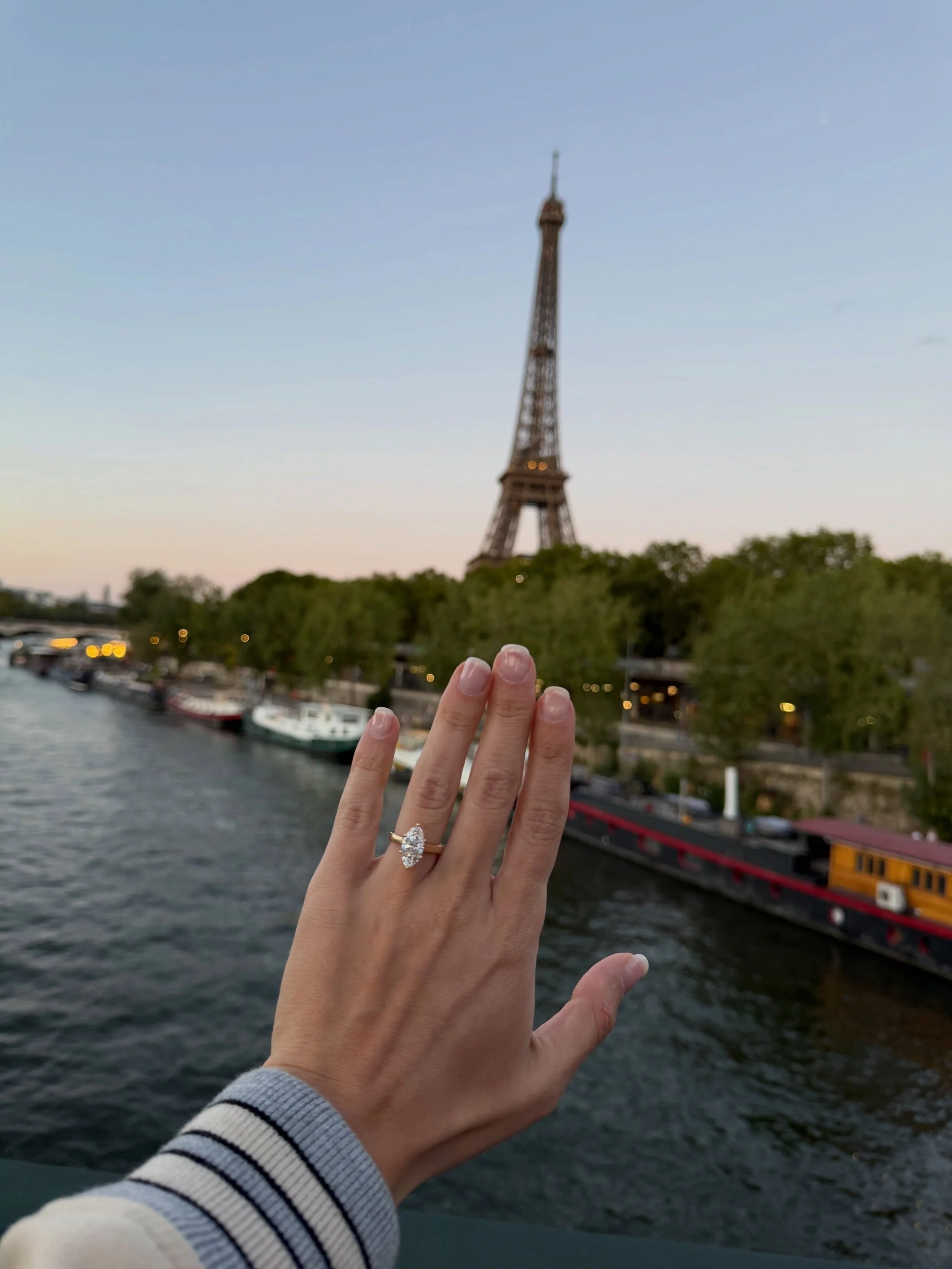 A perfect Paris proposal &mdash; a huge congrats to the sweetest clients on their recent engagement. 🤍 #marquisediamond #engagementringgoals #ringgoals #bridaljewelery