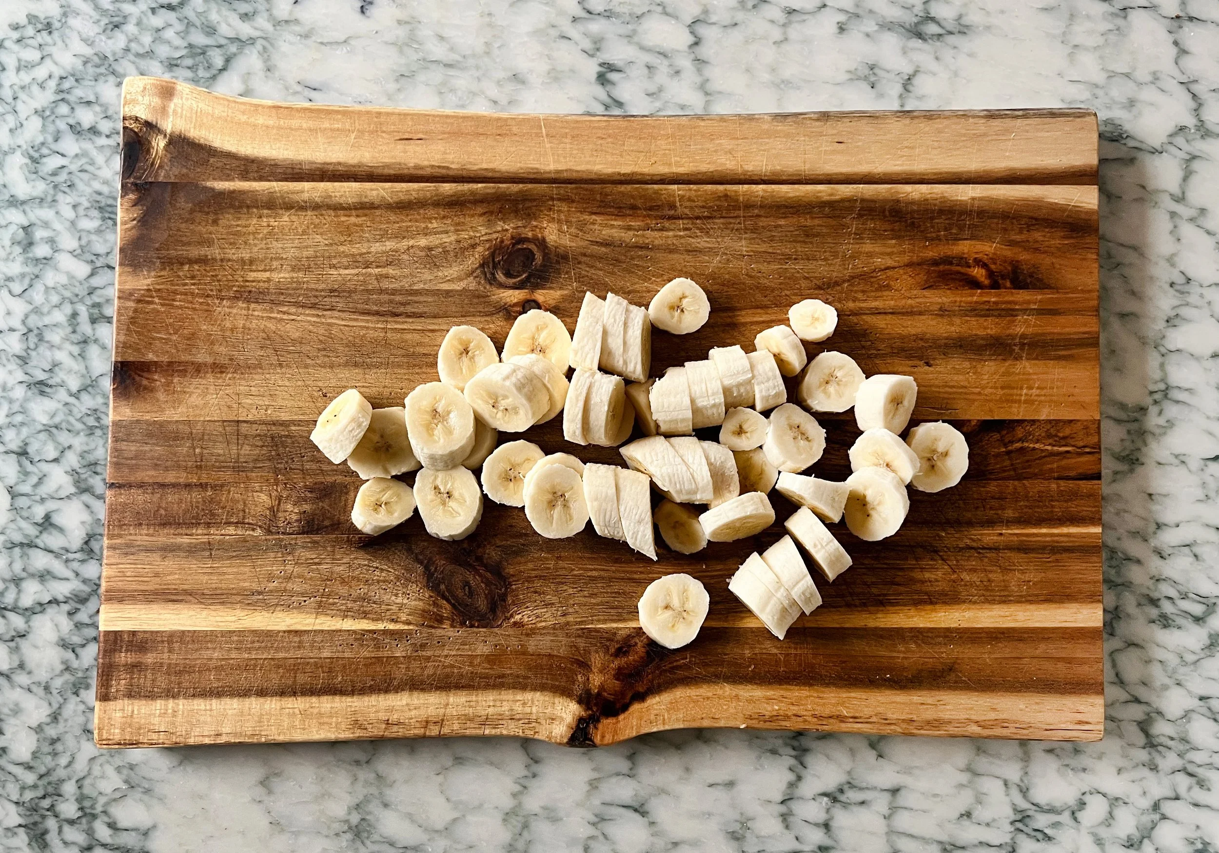 chopped bananas on a cutting board