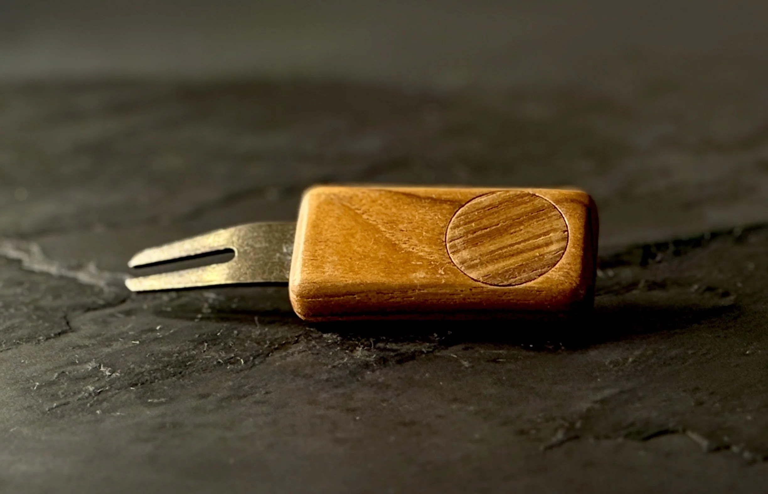 Teak golf divot repair tool with wooden ball marker