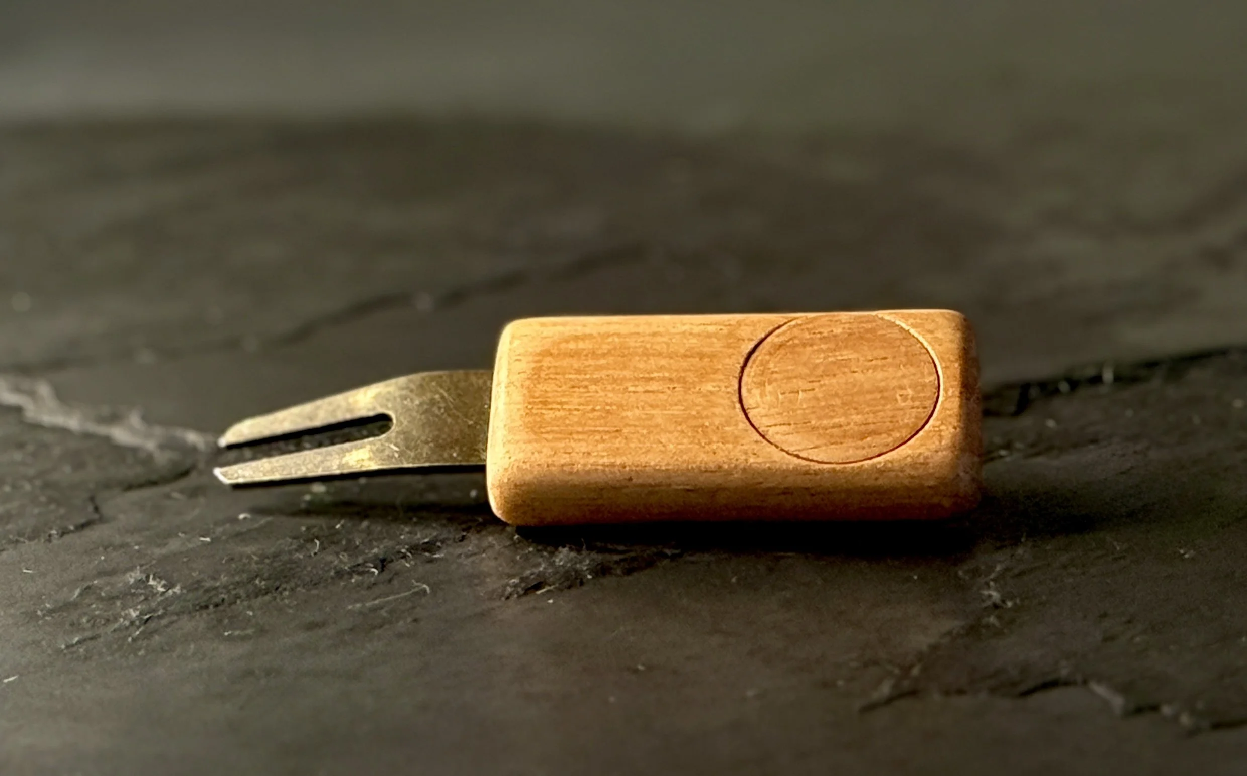 Spanish cedar golf divot repair tool with wooden ball marker