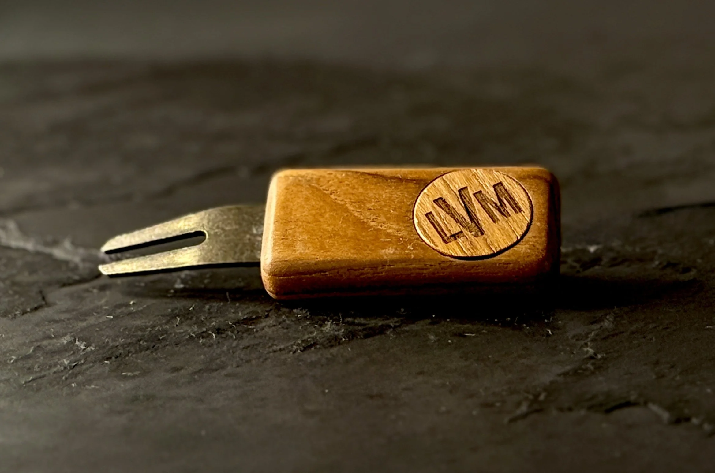 Teak golf divot repair tool with personalized wooden ball marker