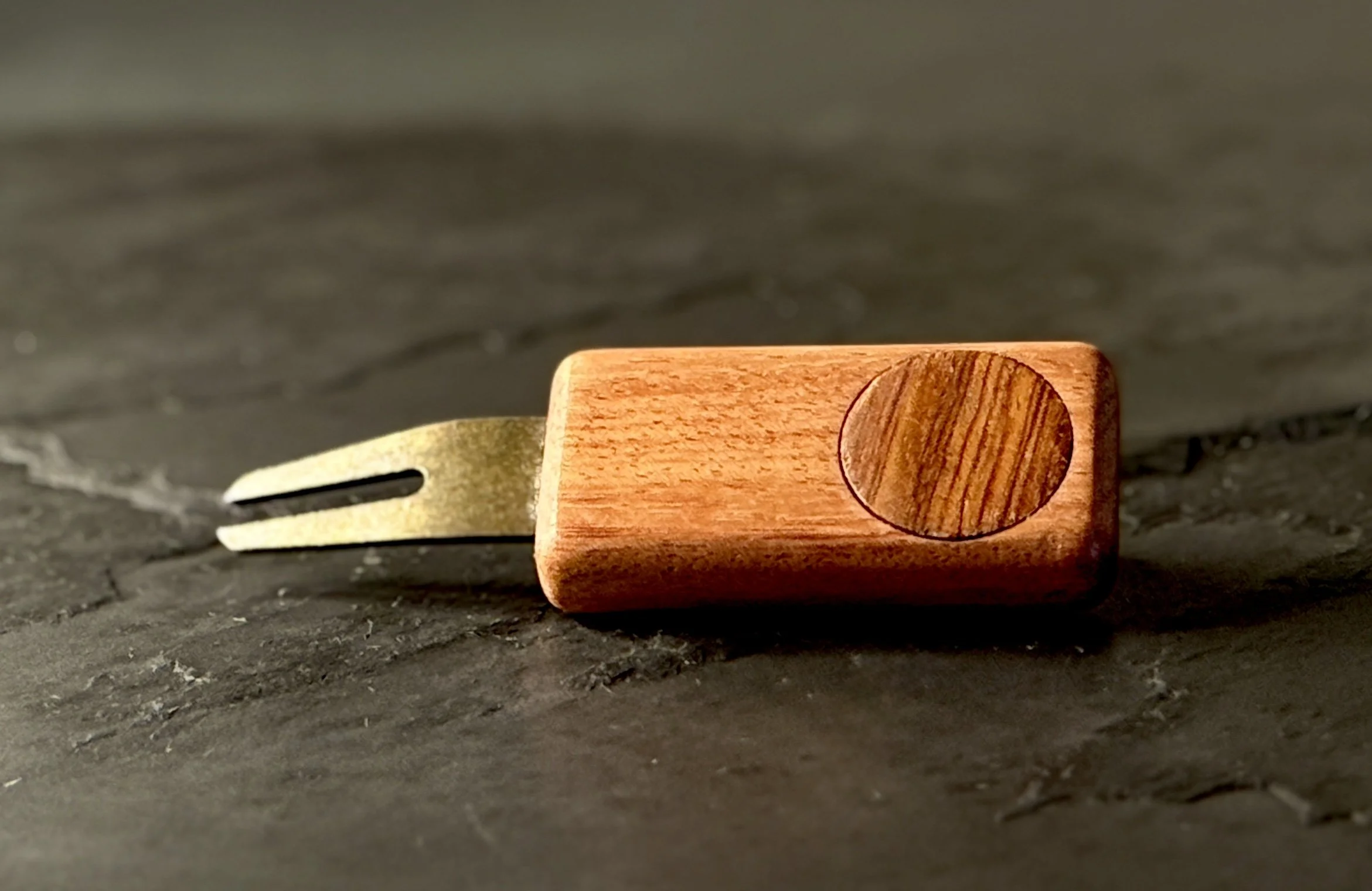 Bubinga golf divot repair tool with wooden ball marker