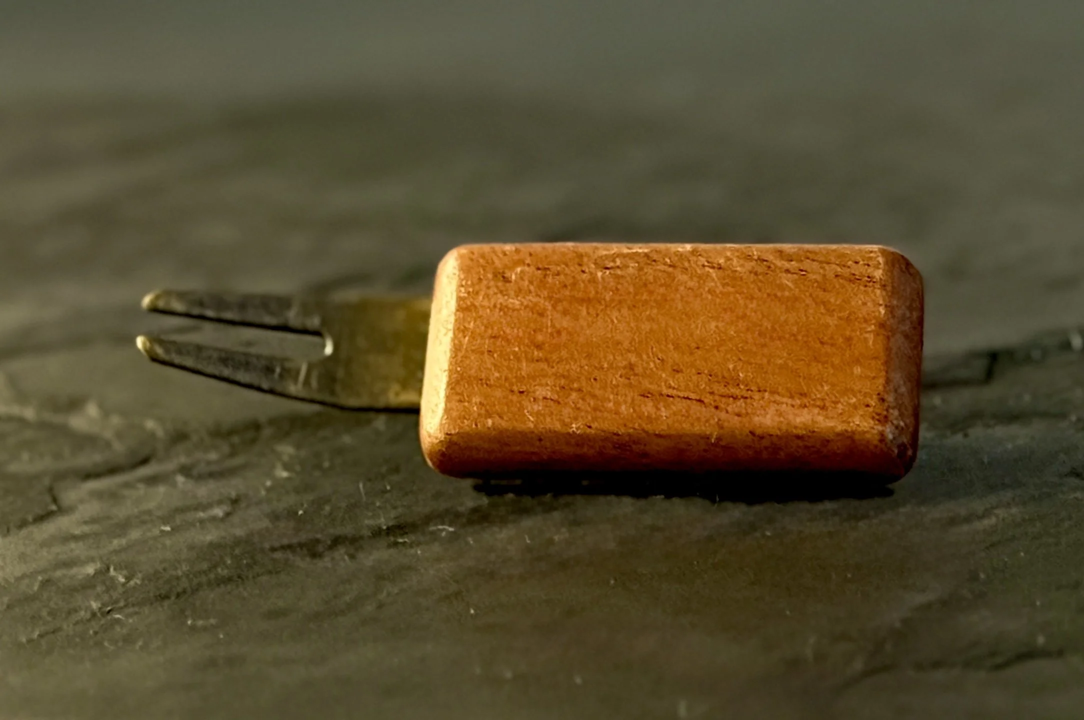 Handcrafted african mahogany wood golf divot tool with antiqued brass hardware