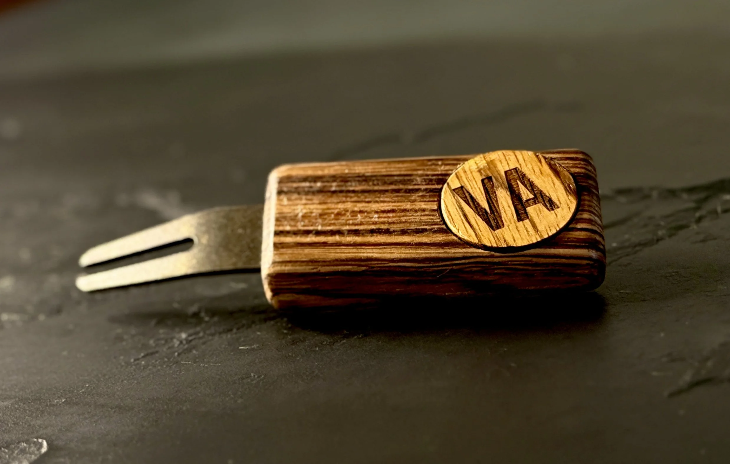 Zebrawood golf divot repair tool with personalized wooden ball marker