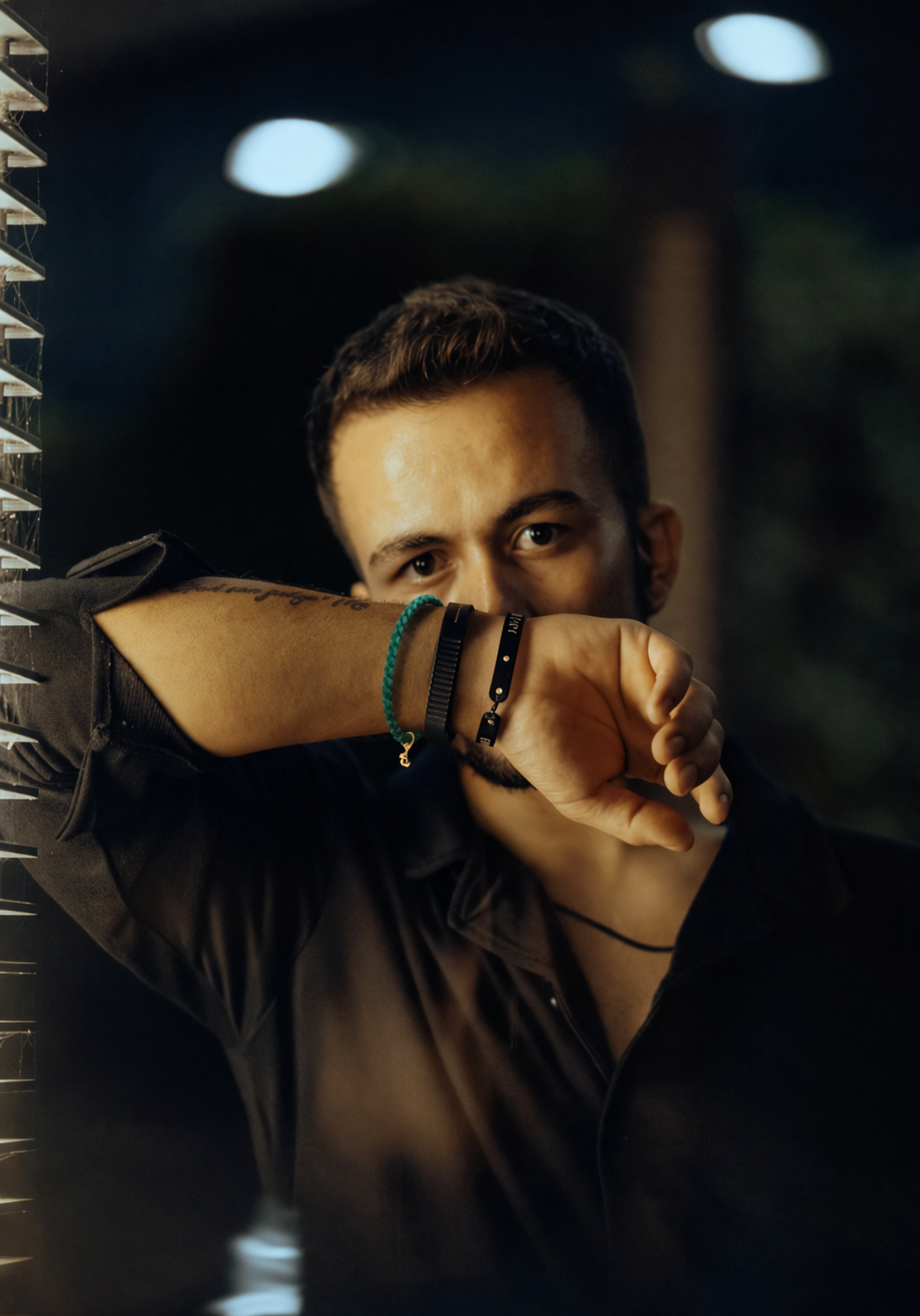 Moody urban portrait with tattoos.png