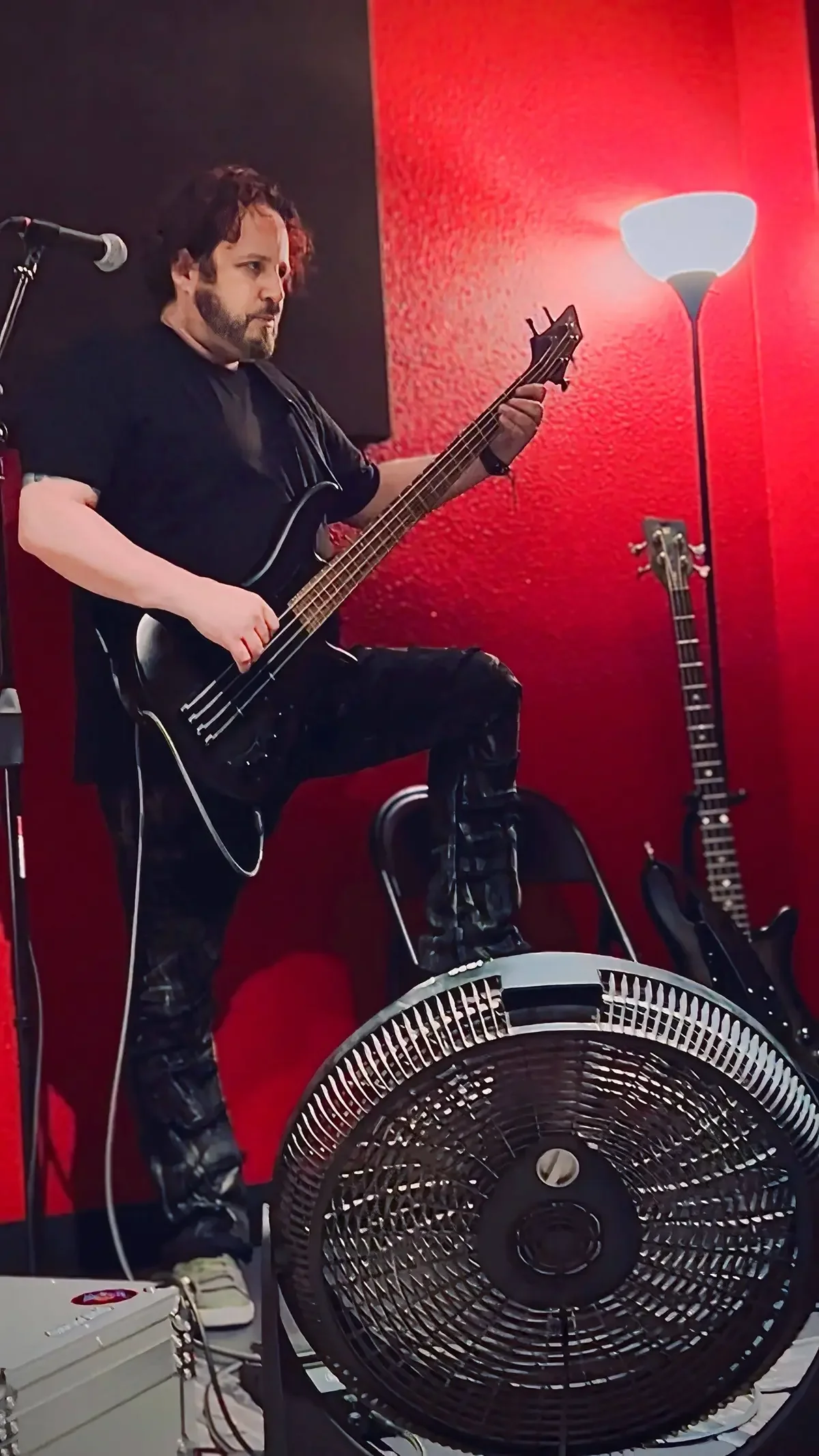 Sam Robertson playing bass during rehearsal for Thee Bad Romantics (Portland's best glam rock wedding and event band) at Avalanche Studios in Portland Oregon.