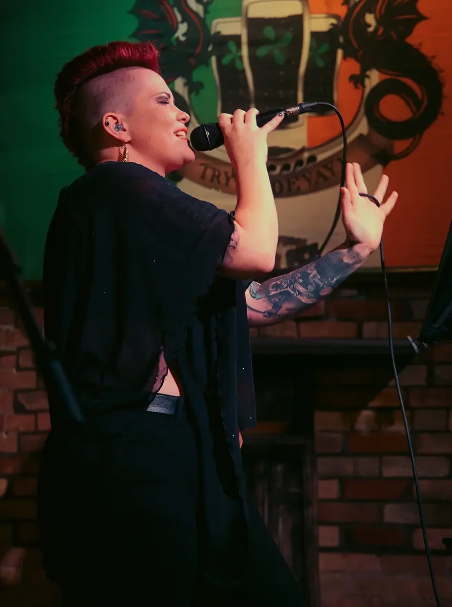 Lady Lulu (Laura Ruesch), lead singer and founding member of Thee Bad Romantics (Portland's Premier Glam Rock Wedding and Event Band), performing live on stage with the spiritual predecessor to Thee Bad Romantics, SoulFang.