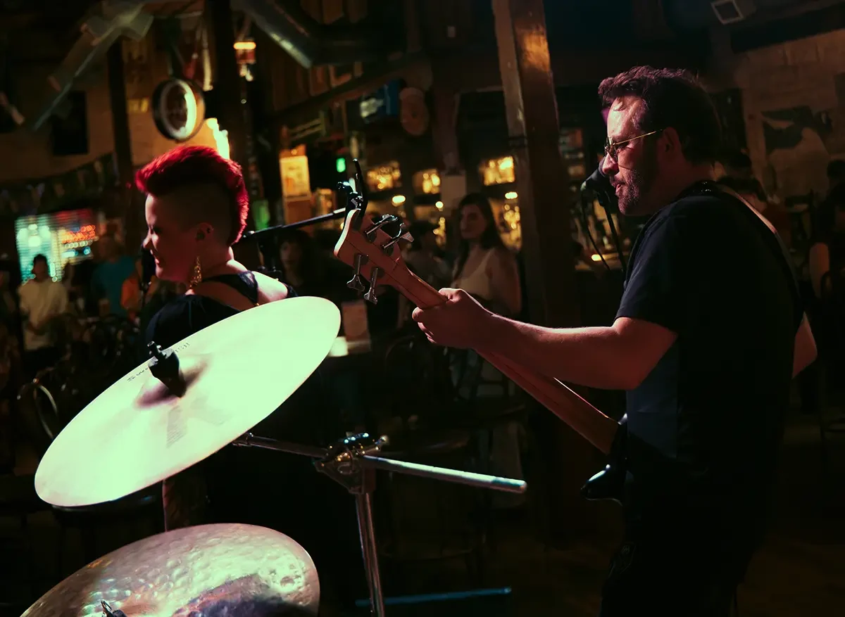 Lady Lulu (Laura Ruesch), lead singer and founding member of Thee Bad Romantics (Portland's Premier Glam Rock Wedding and Event Band), and Sam Robertson, founder of SoulFang and founding member of Thee Bad Romantics, performing live on stage with the