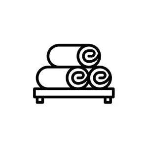 Stack of folded towels on a bed or table