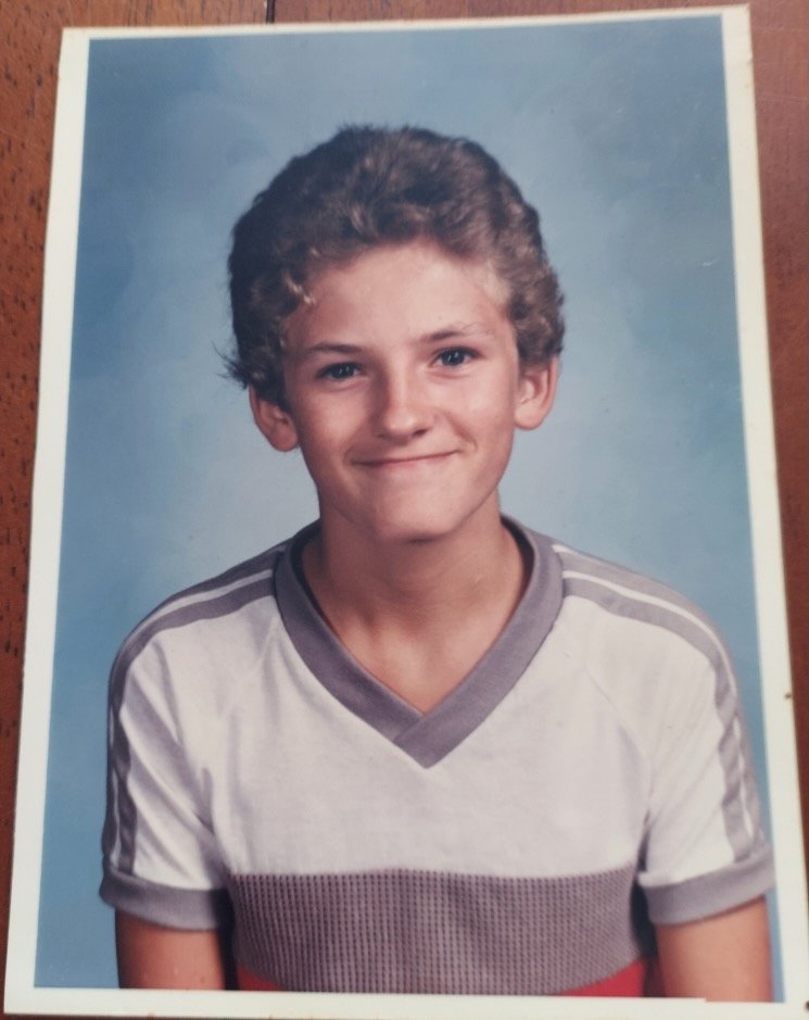 A school portrait of Paul Ruseau as a child.