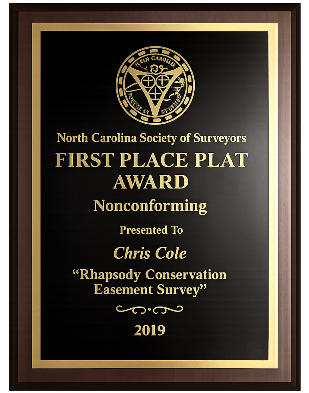 Plaque awarded by the North Carolina Society of Surveyors for first place in nonconforming survey to Chris Cole in 2019.
