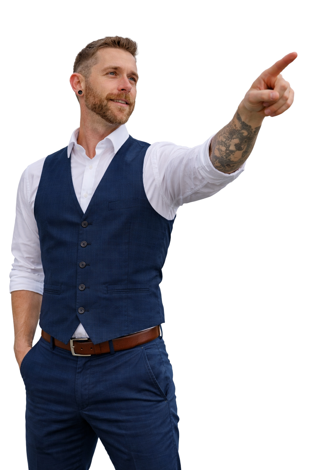 Chris Cole with short hair, beard, and tattooed arm pointing to the right.