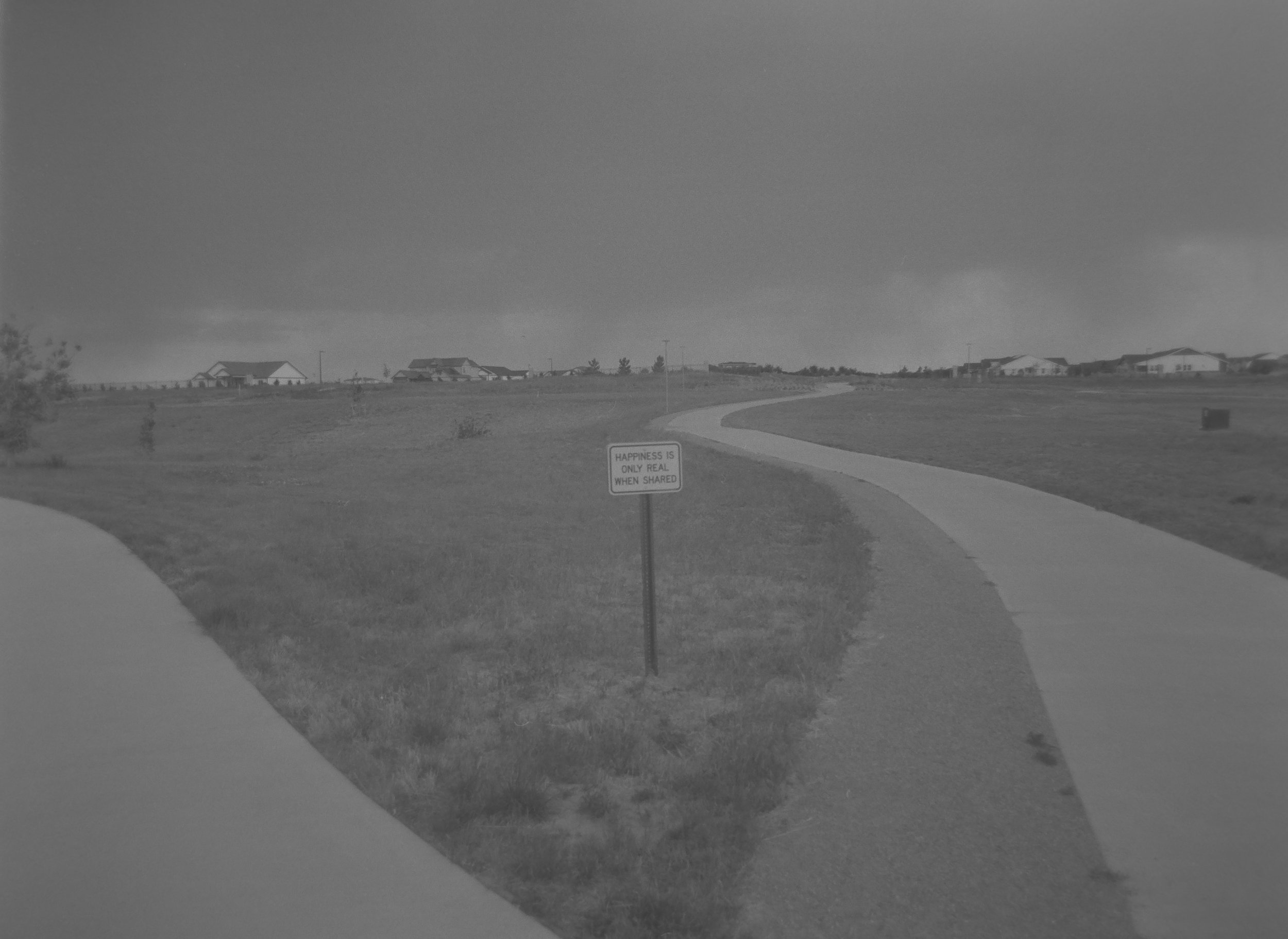 Happiness Is Only Real When Shared - All I Ever Wanted Was Everything
Olivia Steele
Camera: Canon A-1
Film: Kentmere Pan
Speed: 200
Size: 135
Format: Full Frame