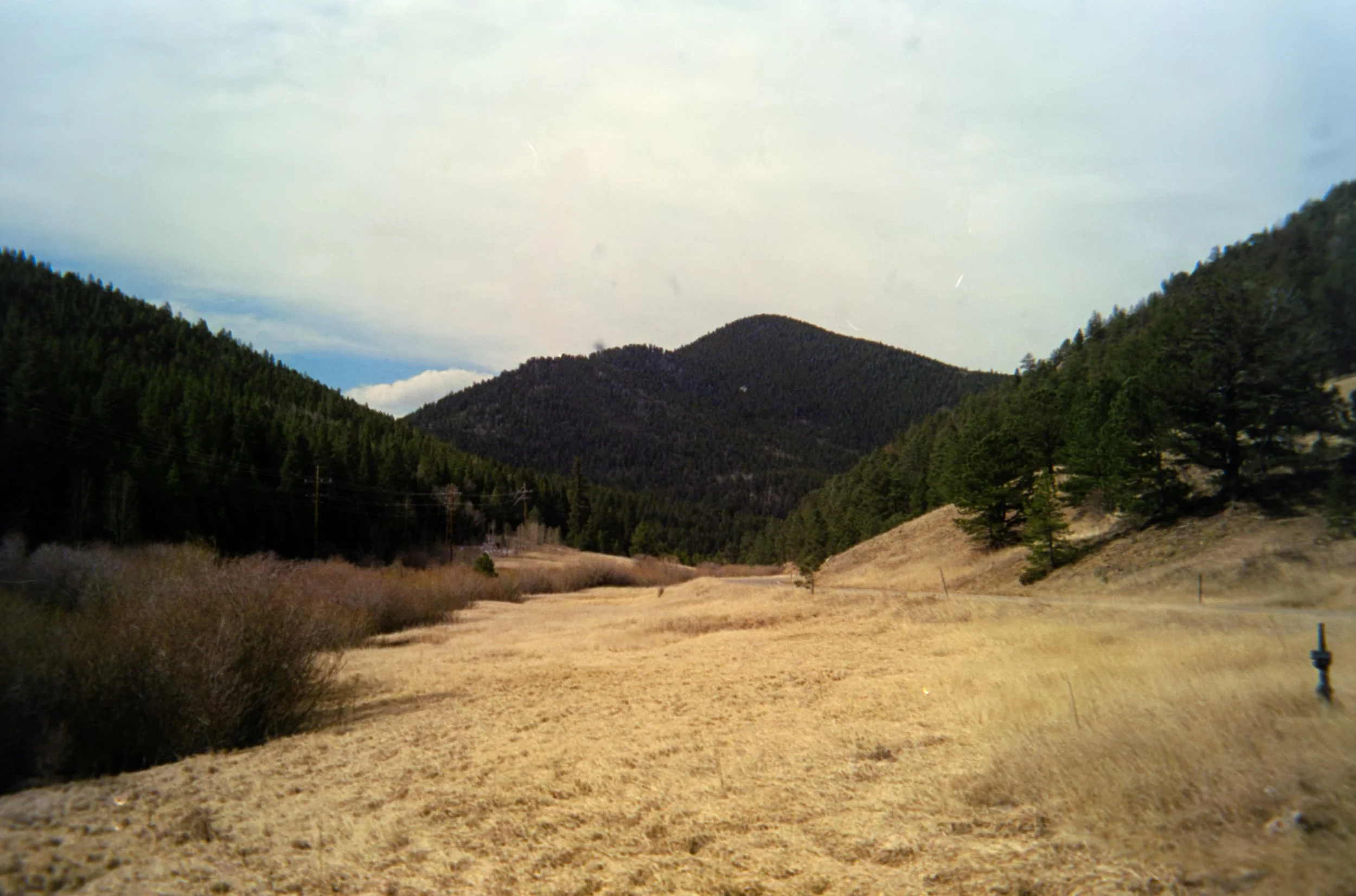 Slough Pond
Camera: Konica Aiborg
Film: Kodak Ultra Max
Speed: 400
Size: 135
Format: Full frame